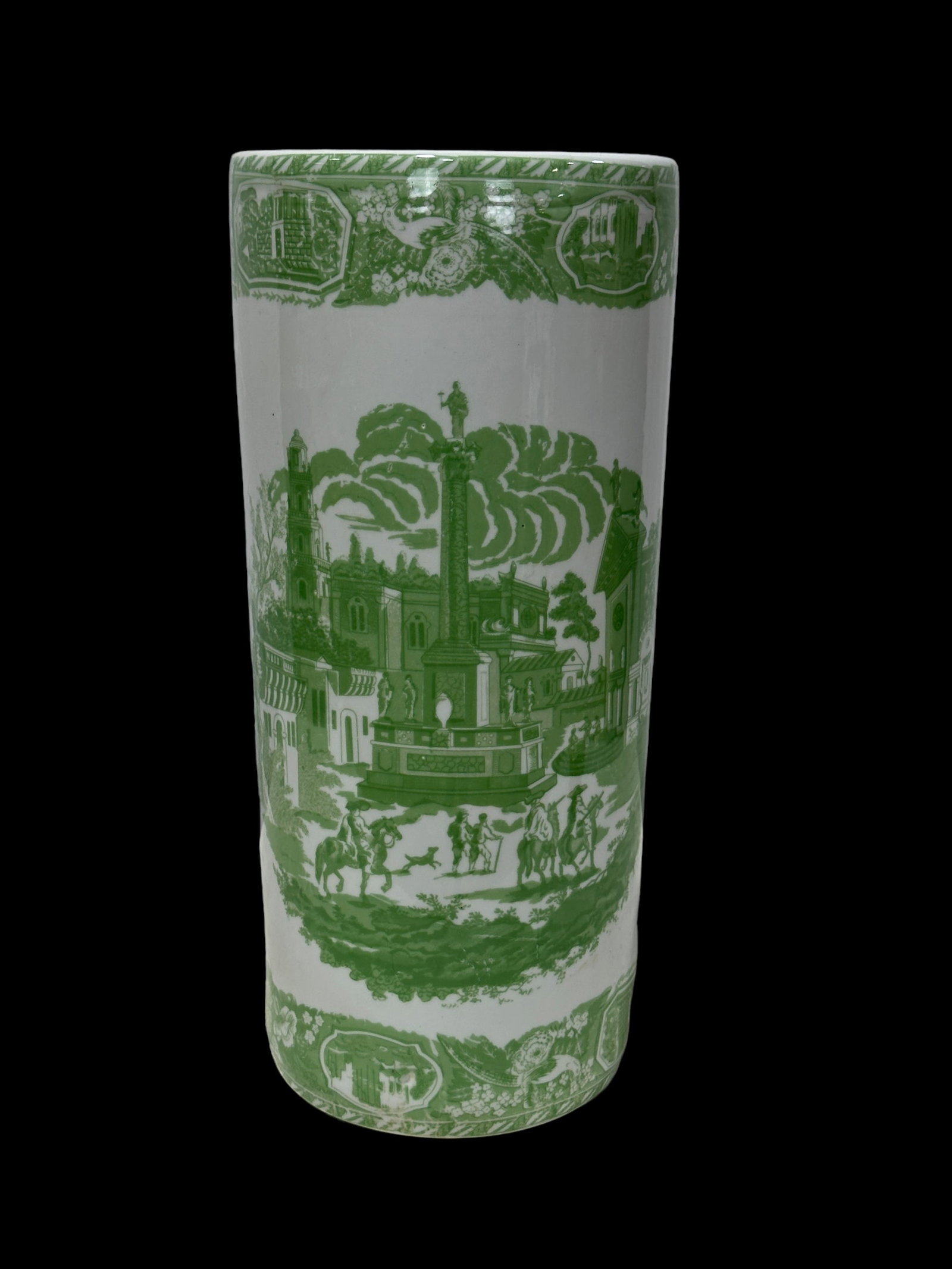Green & White Porcelain Umbrella Stand: Green & White Porcelain Umbrella Stand. Measures 17" tall & 7.5 in diameter.