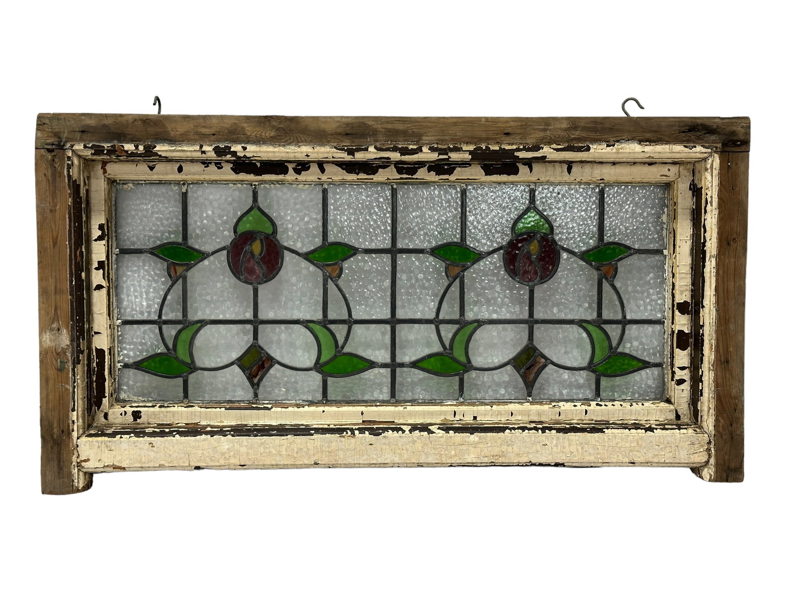 Antique Stained Glass Window: Antique Stained Glass Window. Measures 24.5" x 47".