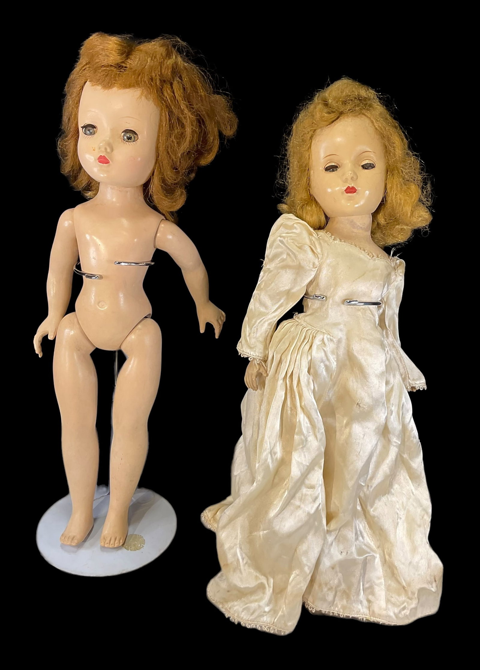 2 Vintage Madame Alexander Dolls: 2 Vintage Madame Alexander Dolls. Measure 14" and 14.5" tall. One is marked"Alexander" and one is marked "ALEX" on back of head. Doll stands are NOT included. All dolls may need cleaning and/or repair