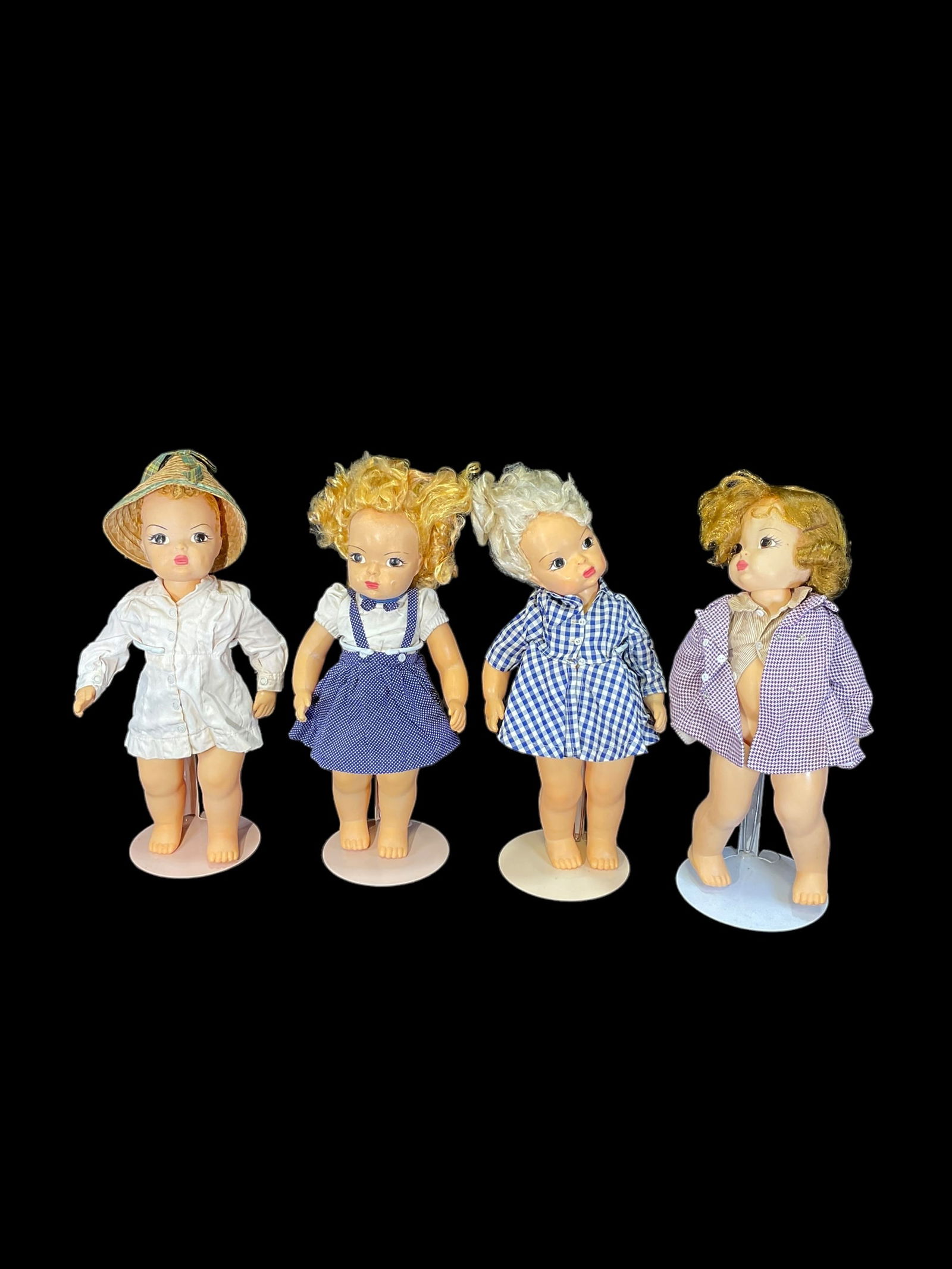 4 Vintage Terry Lee Dolls: 4 Vintage Terry Lee Dolls. Measure 16" tall. Some have original Terry Lee clothing. One is missing most of it's hair. Doll stands are NOT included. All dolls may need cleaning and/or repair. Refer to