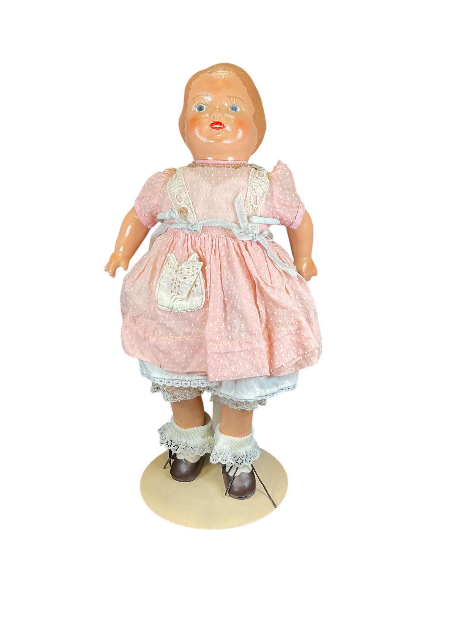 Antique Effanbee Baby Dainty Doll: Antique Effanbee Baby Dainty Doll. Measures 14" tall and is marked "Effanbee Baby Dainty" on back. Has a cloth body and the rest is composition. She has been repainted. Doll stands are NOT included. A