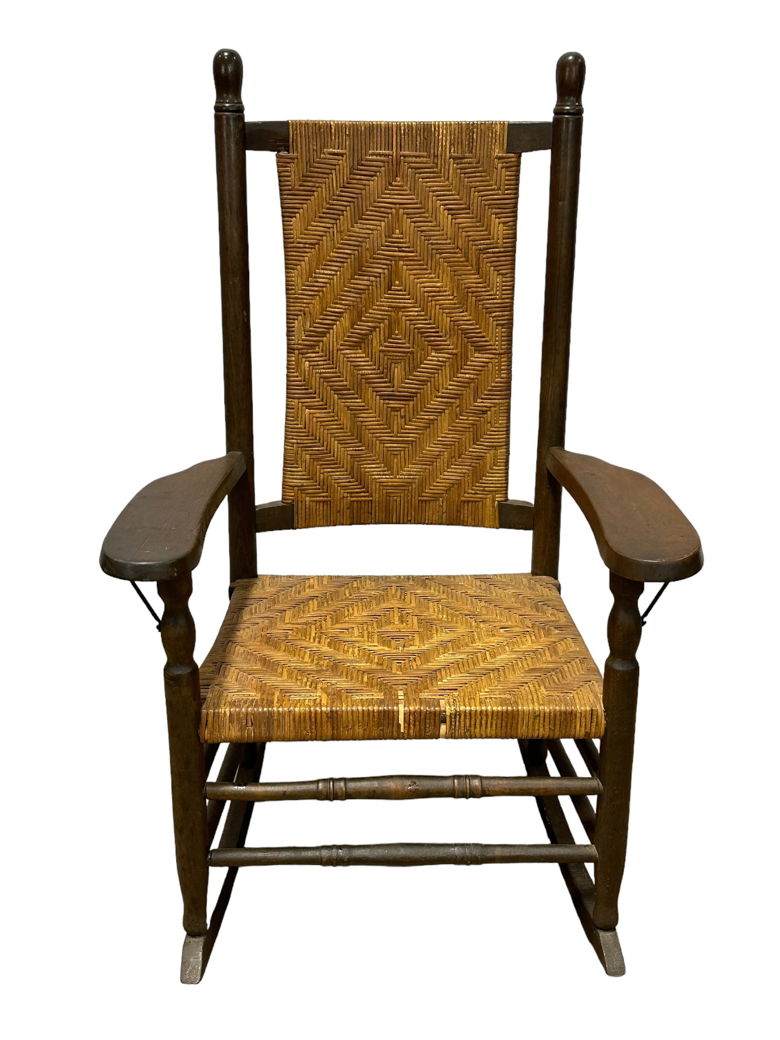 Vintage Paddle Arm Woven Cane Rocking Chair: Vintage Paddle Arm Woven Cane Rocking Chair. Measures 44" H x 28" W x 35" & the seat height measures 16" tall.