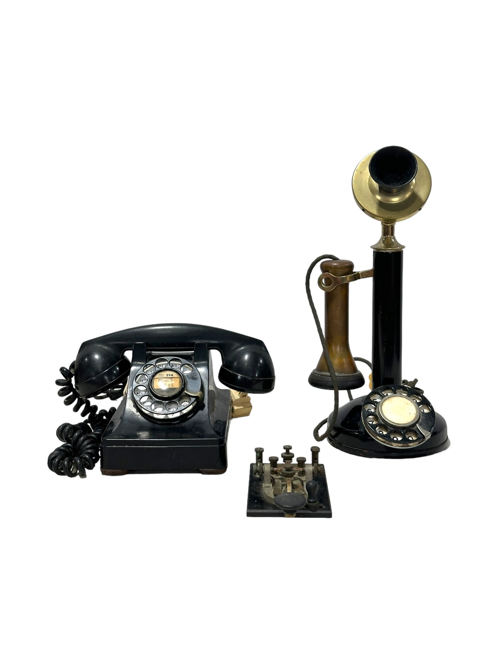 2 Vintage Rotary Telephones & Morse Code Telegraph Key: 3 Vintage Rotary Telephones & Morse Code Telegraph Key. Candlestick phone 13" tall & untested. Bell system Western Electric Co. phone measures 5.5" H x 9" W x 7.5" D & untested. J38 Morse code telegra