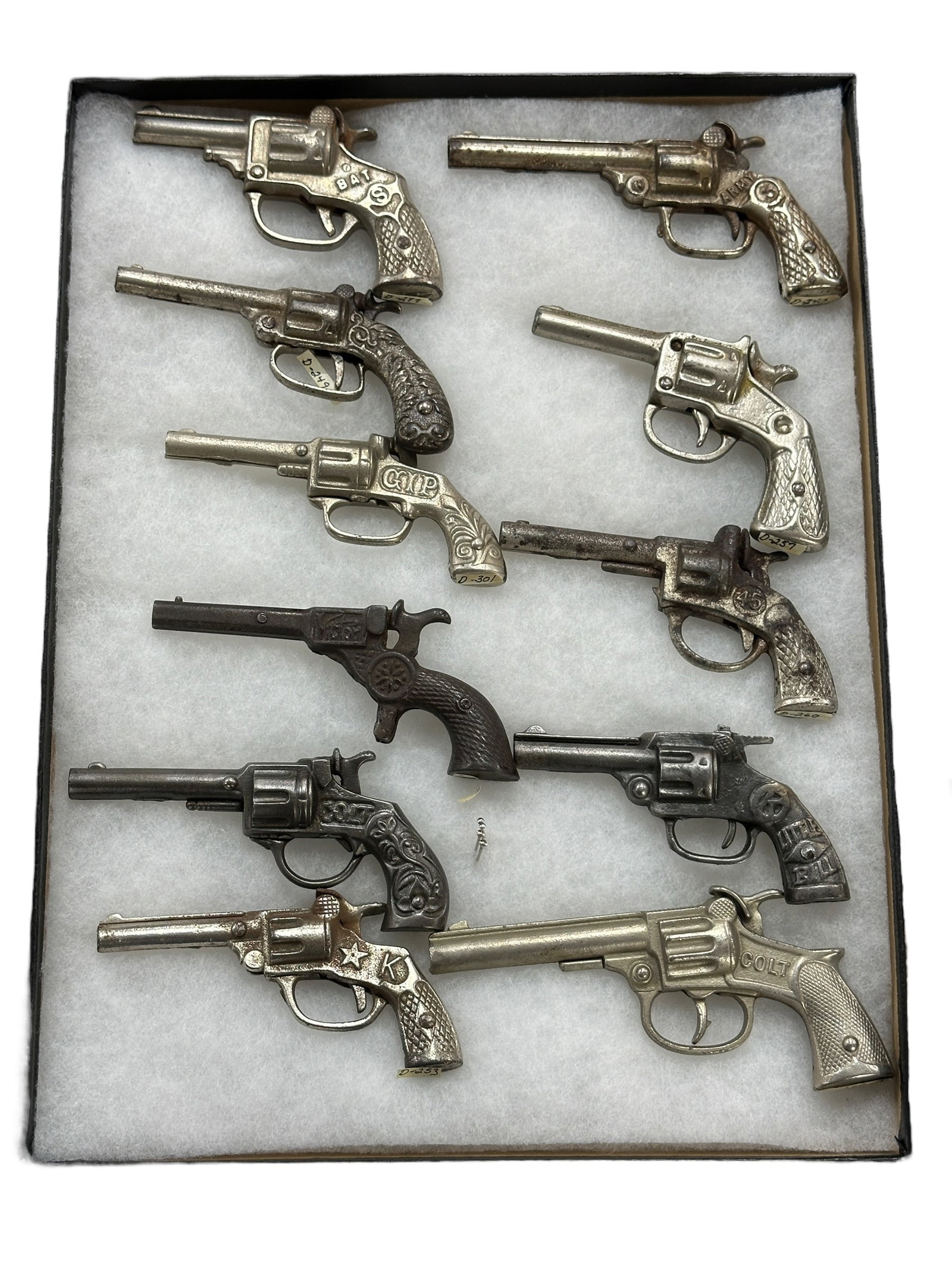 11 Cap Guns in Display Case: 11 Cap Guns in Display Case