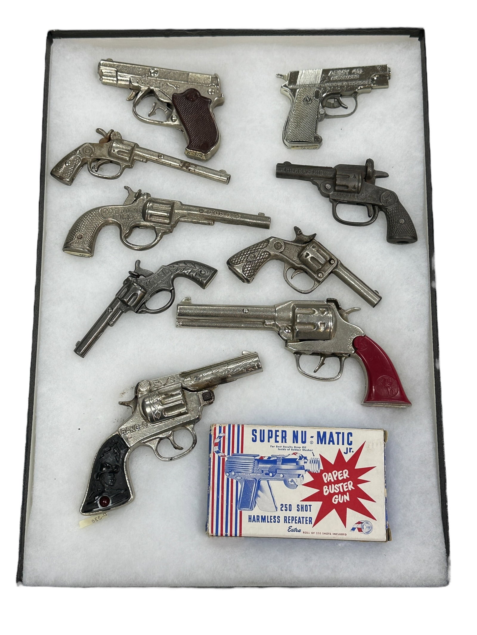10 Cap Guns in Display Case: 10 Cap Guns in Display Case