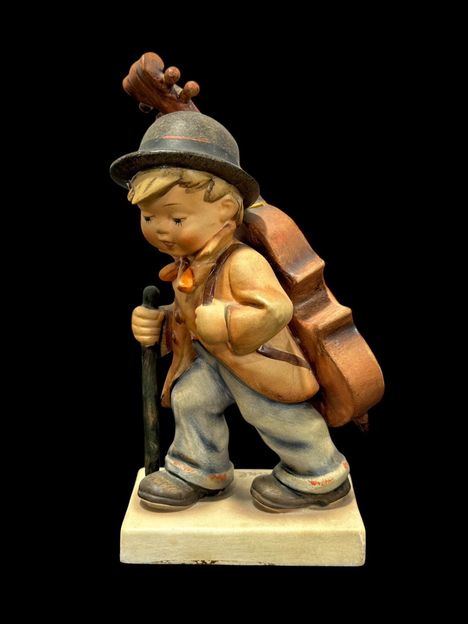 "Little Cellist" Hummels Figure: "Little Cellist" Hummels Figure. Measures 7.75" tall & marked "Mj Hummel on base & "Germany" on the bottom.