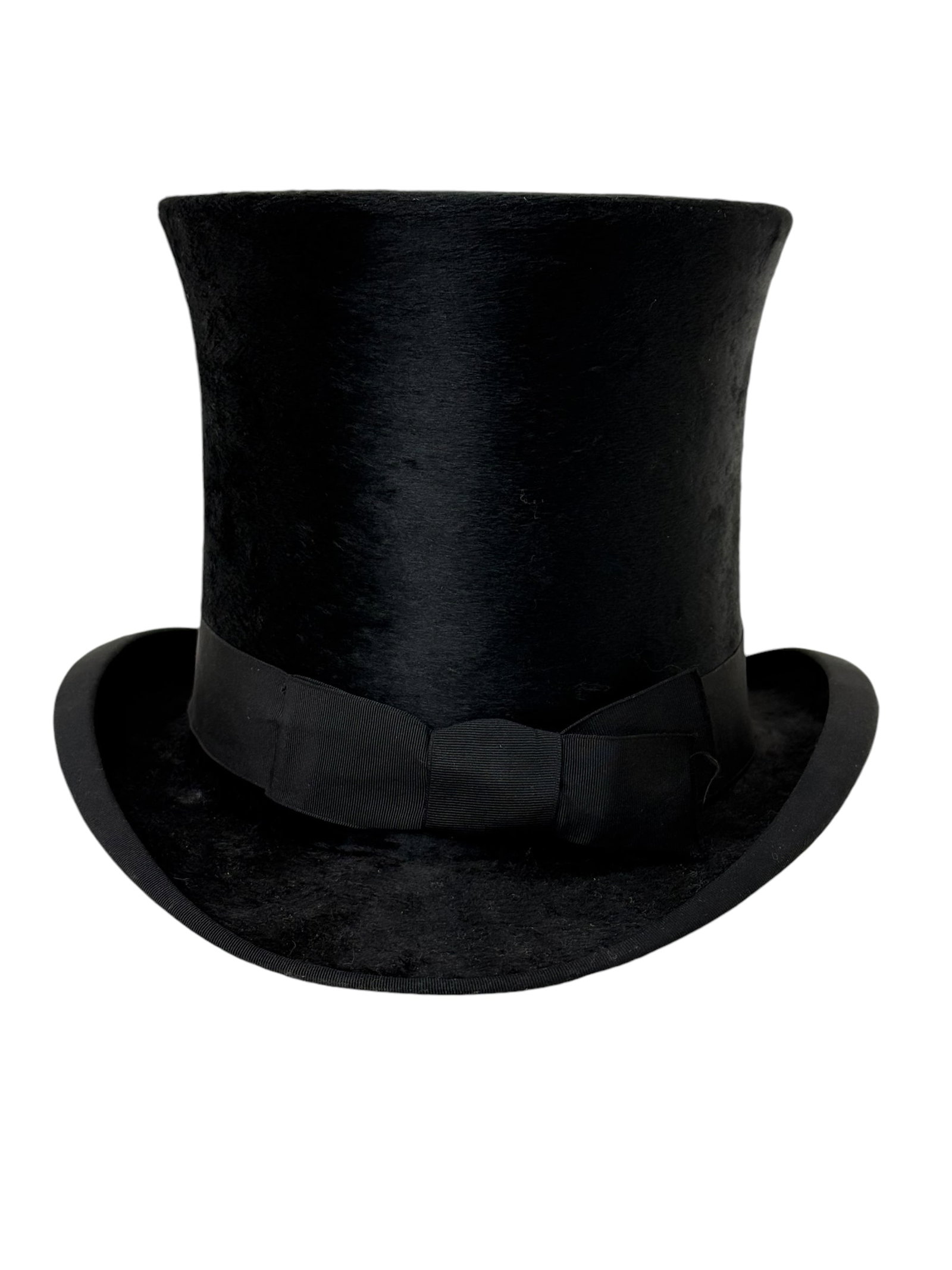 19th C. English Hope Brothers Top Hat: 19th C. English Hope Brothers Top Hat. Marked Extra Quality, Hope Brothers, Limited, London on the inside of hat. Measures 6.75" Tall.