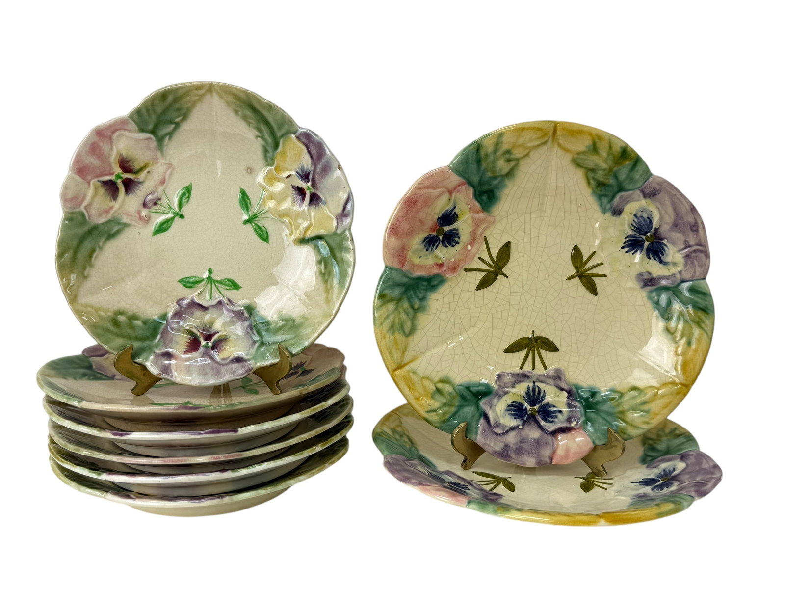 Set of 8 Antique French Majolica Pansy Plates: Set of 8 Antique French Majolica Pansy Plates. 6 Hippolyte Boulenger Choisy-Le-Roi are marked on the bottom (1 plate is newer) and measure 8.25" Diameter. 2 Faience D'Art Plates are marked on the bott