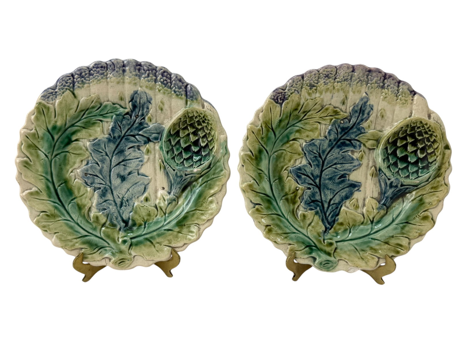 Pair of 19th C. French Majolica Asparagus & Artichoke Plates: Pair of 19th C. French Majolica Asparagus & Artichoke Plates. Plates measure 9.5" Diameter.