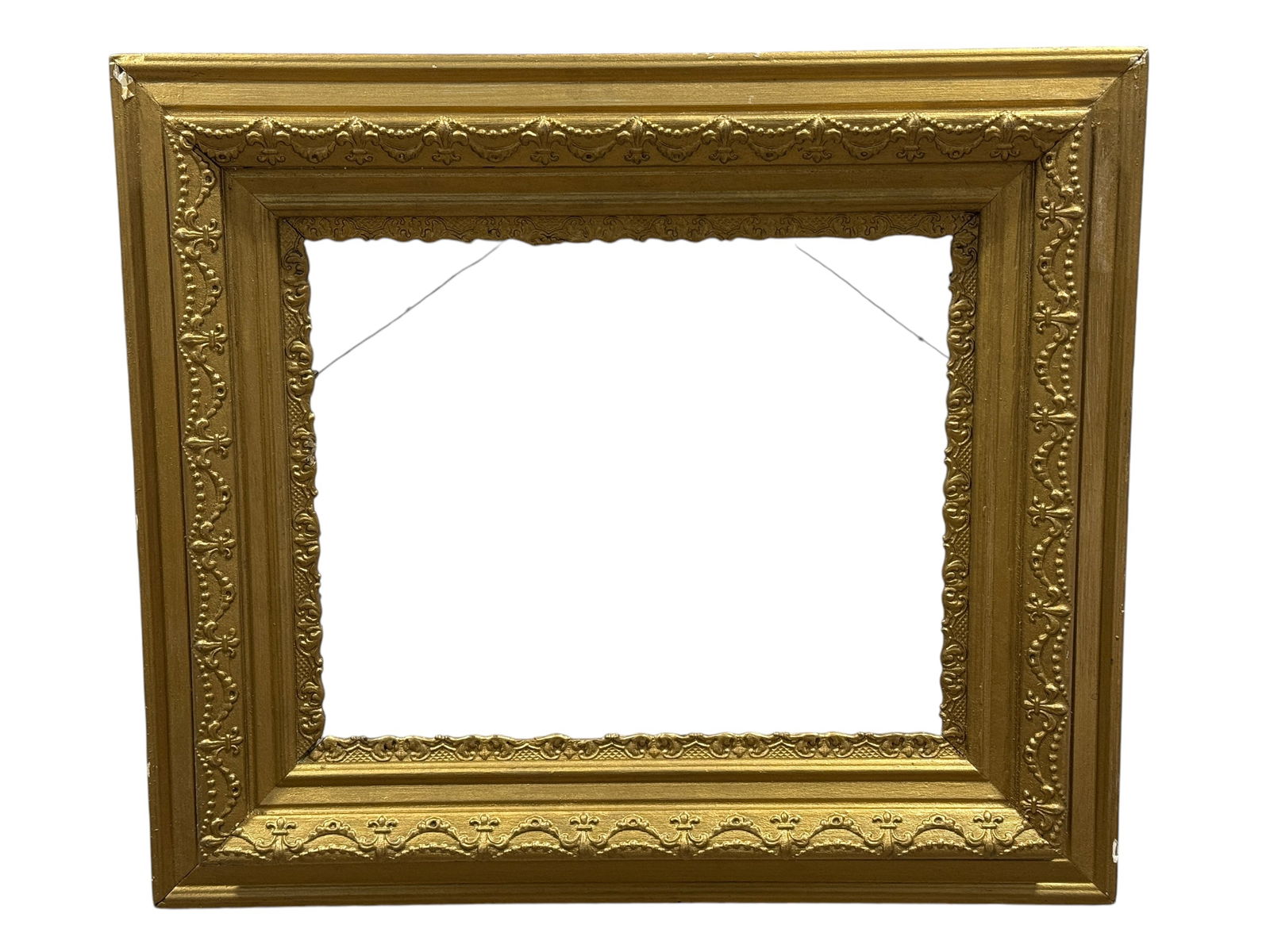 Early 20th C. Gold Gilt Wood Frame: Early 20th C. Gold Gilt Wood Frame. Inside frame measures 19.25" x 15.25". Frame overall measures 30.25" x 26.25".