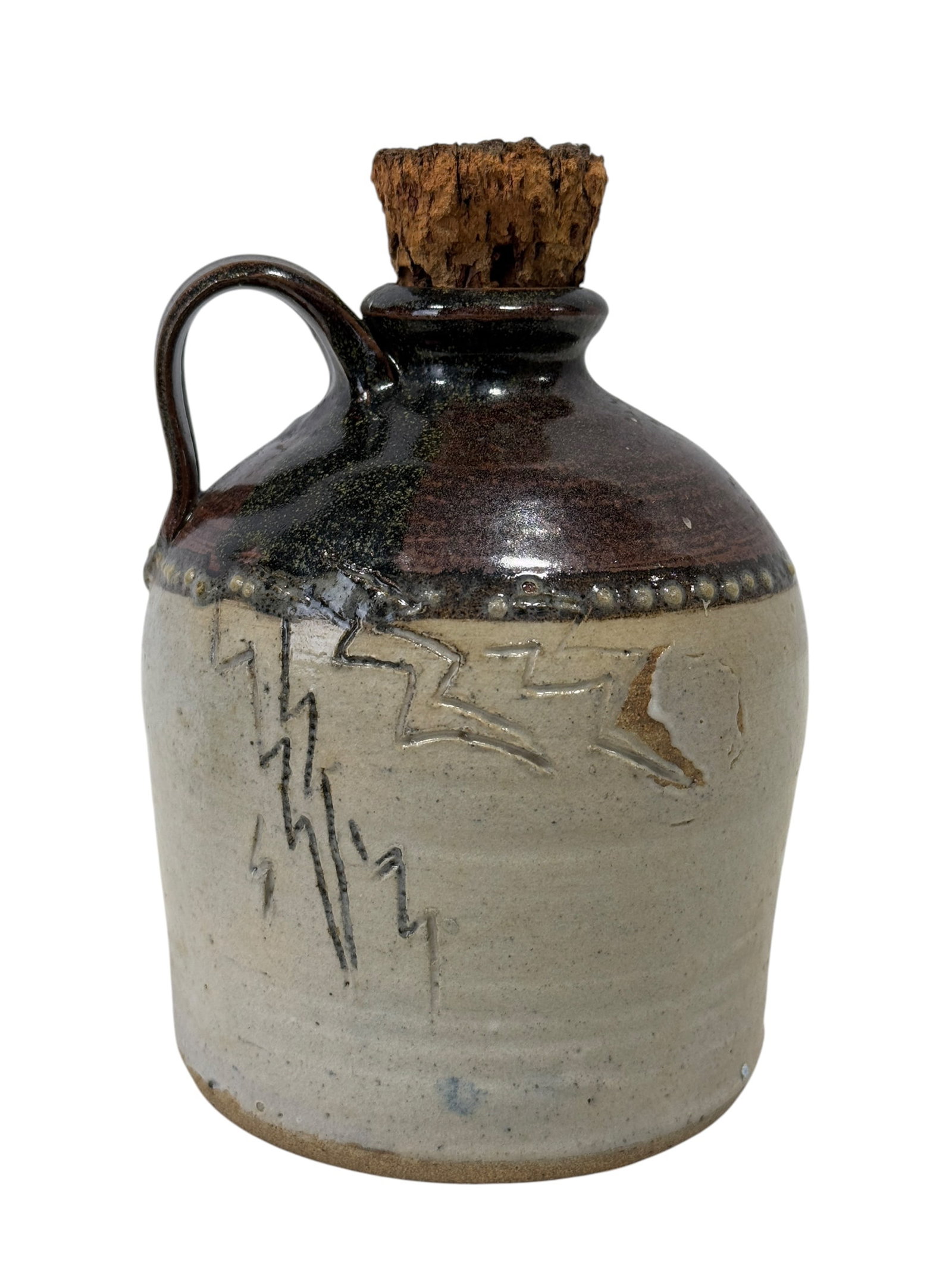 Signed Miller Pottery Whiskey Jug w/ Cork: Signed Miller Pottery Whiskey Jug w/ Cork. Signed on the bottom. Measures 7.5" Tall.