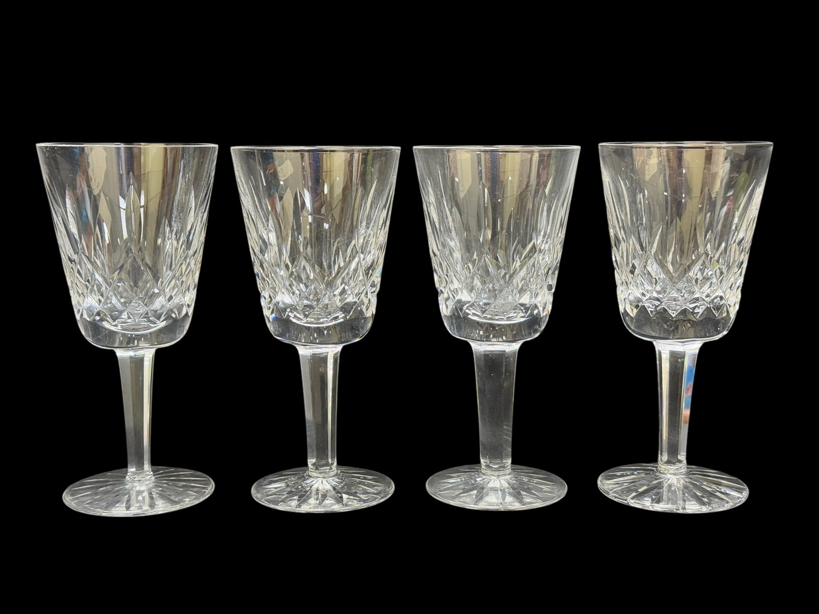 Set of 4 Waterford Crystal Lismore Goblets: Set of 4 Waterford Crystal Lismore Goblets. Measures 5.5" Tall.