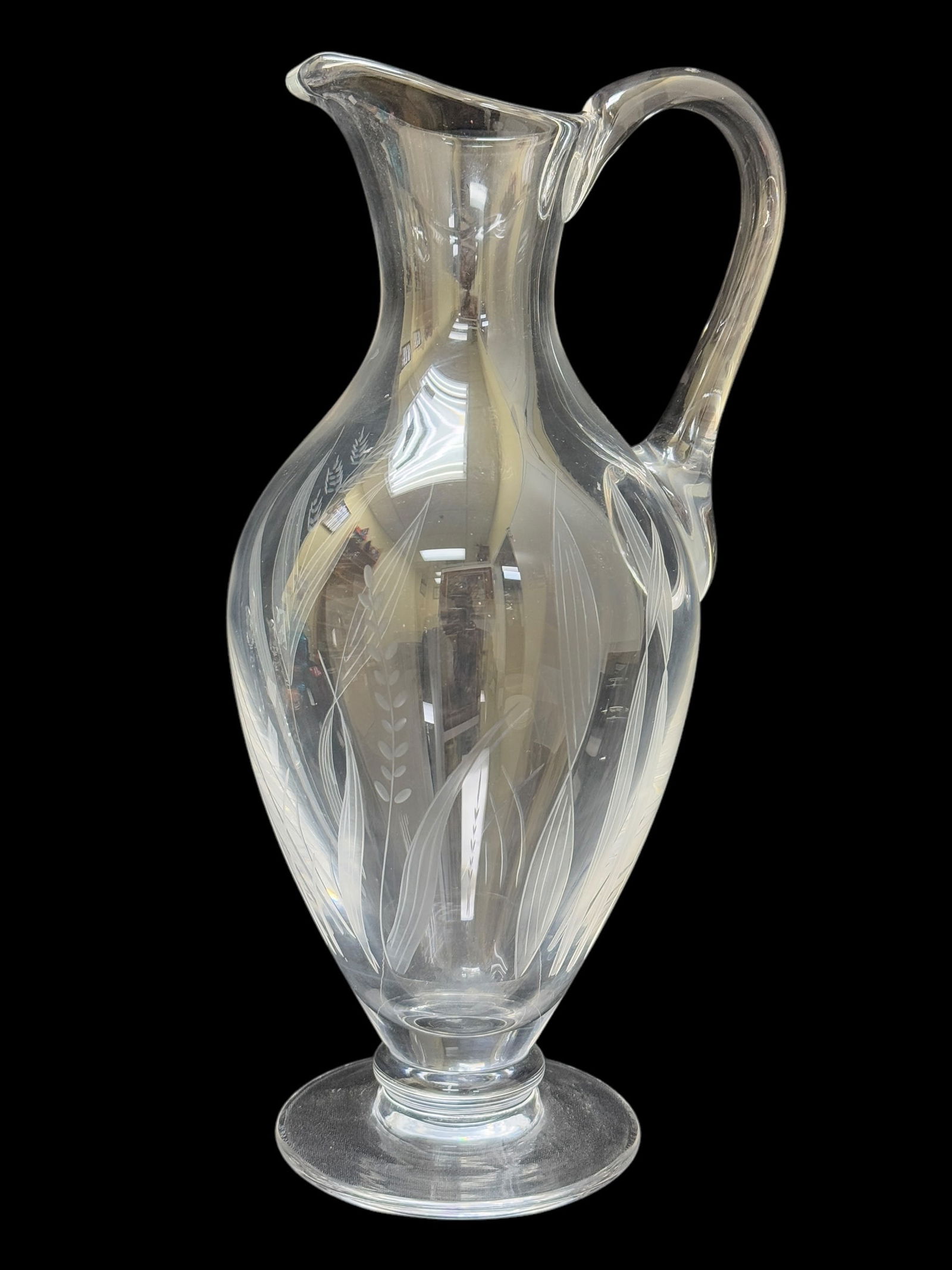 William Yeoward Etched Crystal Glass Pitcher: William Yeoward Etched Crystal Glass Pitcher. Marked William Yeoward on the bottom. Measures 12.25" Tall.