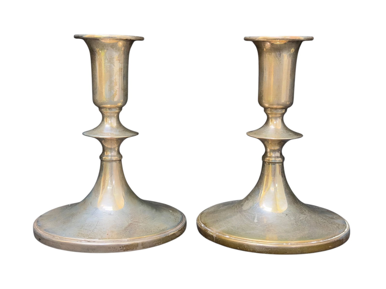 Pair of Sterling Cartier Candlesticks: Pair of Sterling Cartier Candlesticks. Weighted. Measures 5" Tall.