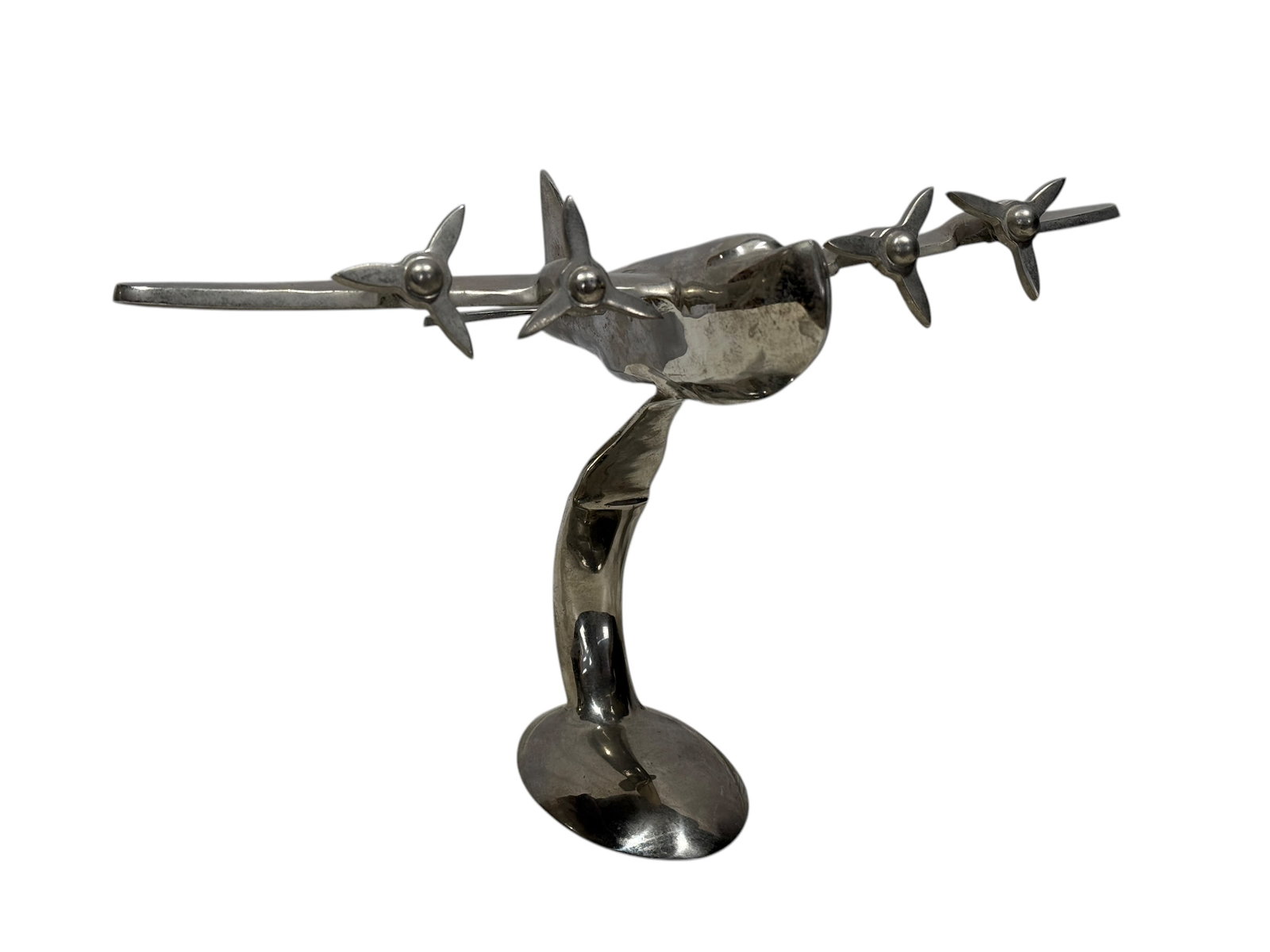 Vintage Aluminum Plane Sculpture: Vintage Aluminum Plane Sculpture. Measures 9" H x 14.5" W x 10" D.