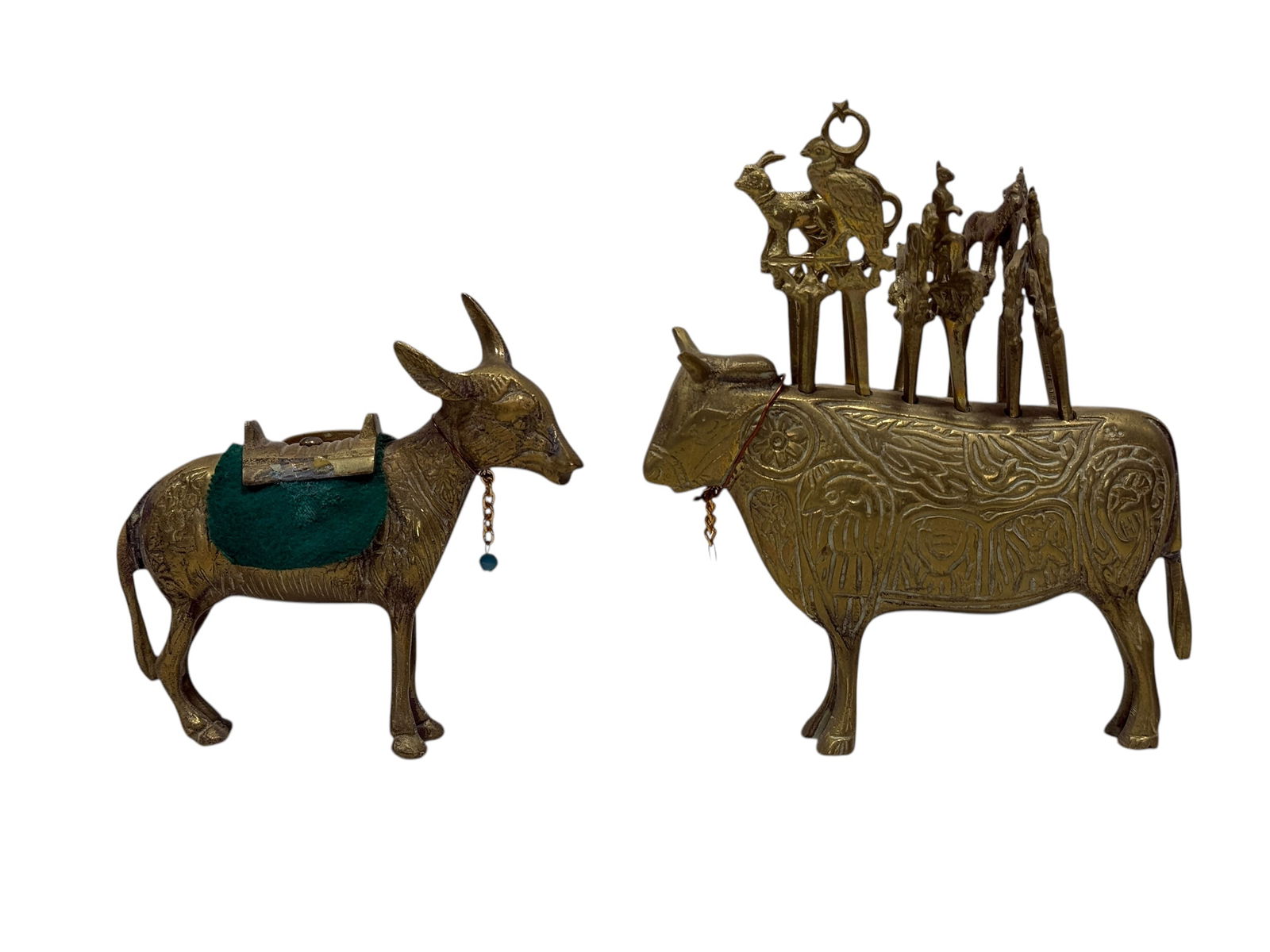 Lot of 2 Brass Pieces: Lot of 2 Brass Pieces. Brass Bull w/ 12 Brass Skewers measures 4" H x 5.25" W and the skewers measure approx. 3..75" long. Brass Donkey measures 4.5" H x 4.5" W.