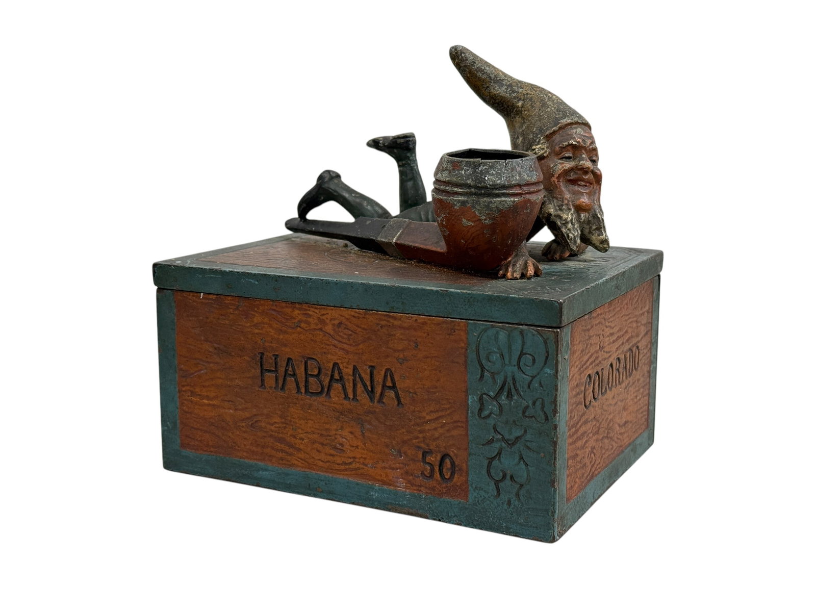 Ca. 1900s Metal Gnome Habana Humidor: Ca. 1900s Metal Gnome Habana Humidor. Marked Habana Colorado 50 and the pipe on top is marked FB. Measures 6.25" H x 6" W x 4.5" D.