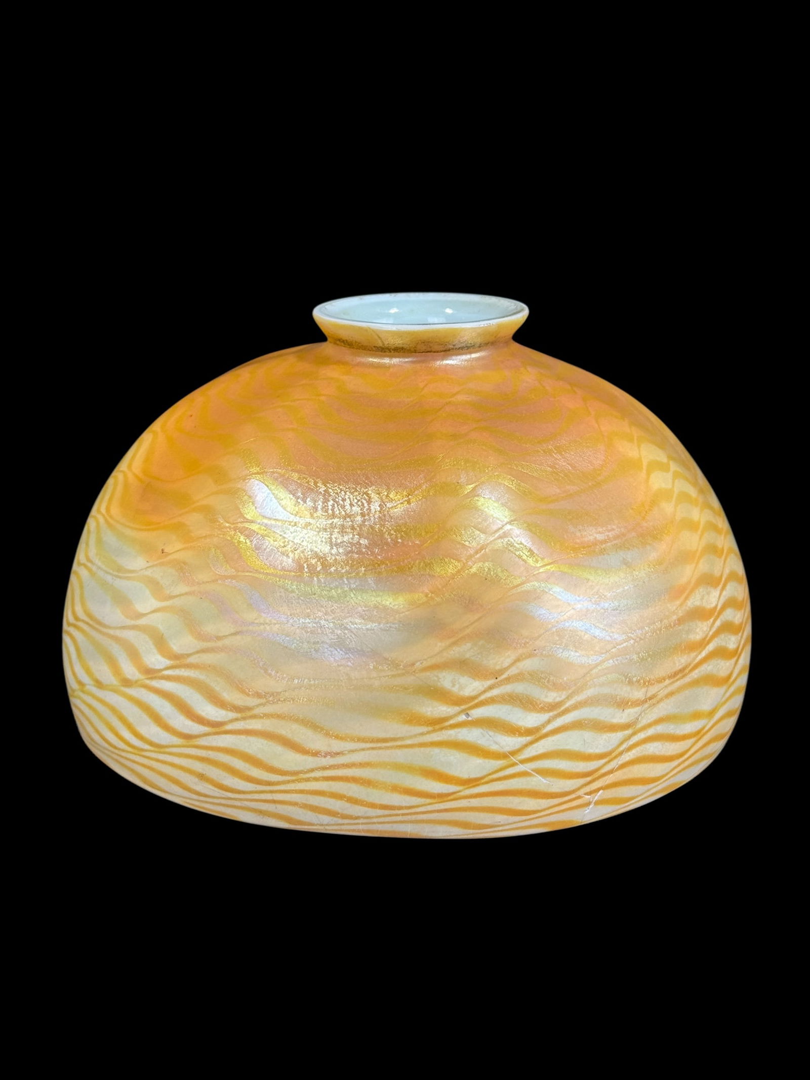 Tiffany Studios Favrile Art Glass Lamp Shade: Tiffany Studios Favrile Art Glass Lamp Shade. Marked L.C.T. on the inside top rim. Measures 4.25" H x 7" Diameter.