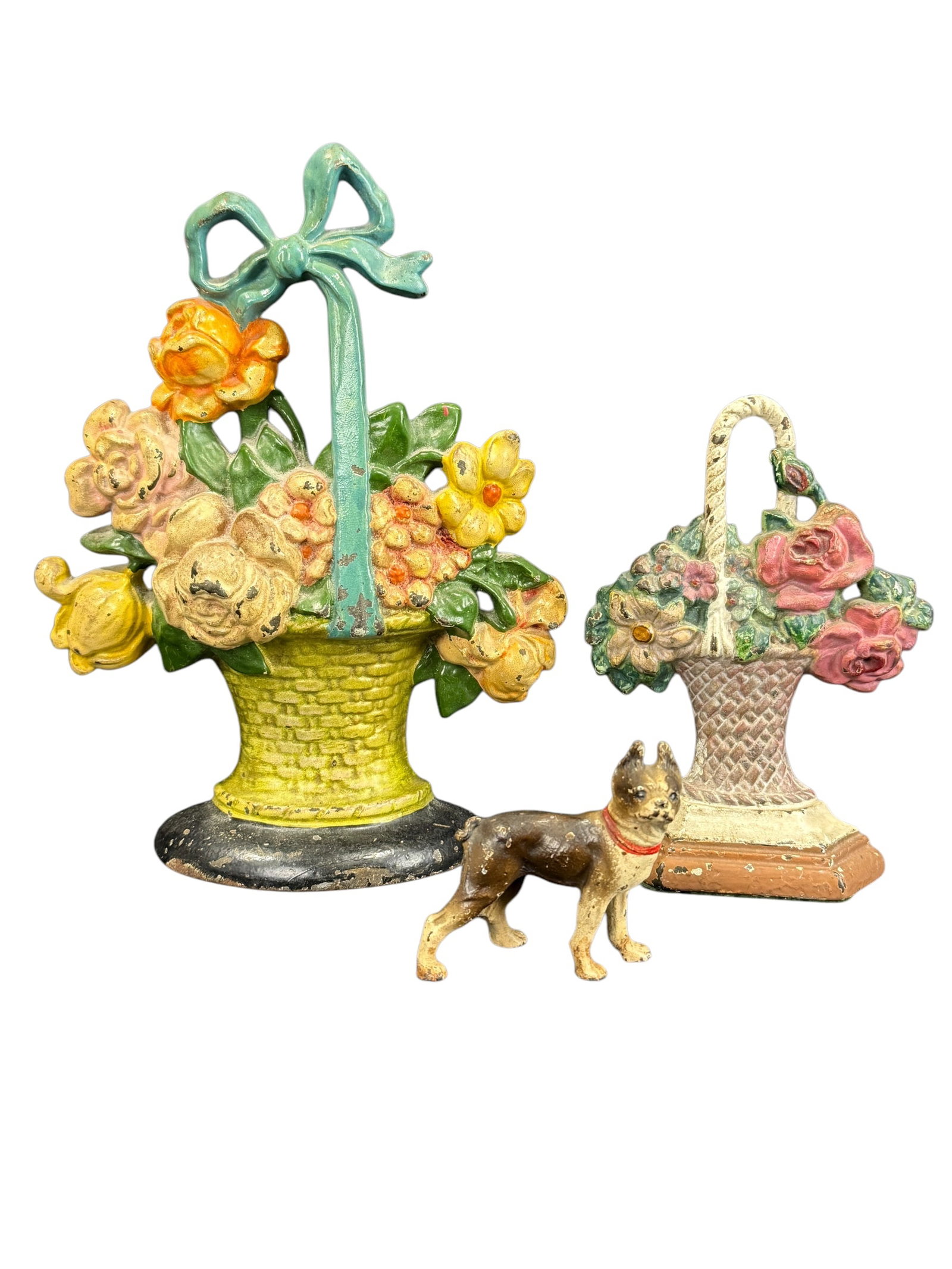 Group of 2 Antique Cast Iron Doorstops & Dog Figure: Group of 2 Antique Cast Iron Doorstops & Dog Figure. 2 Antique Cast Iron Basket Doorstops measure 10.5" Tall and 7.25" Tall. Antique Cast Iron Boston Terrier measures 3" H x 3.25" W.