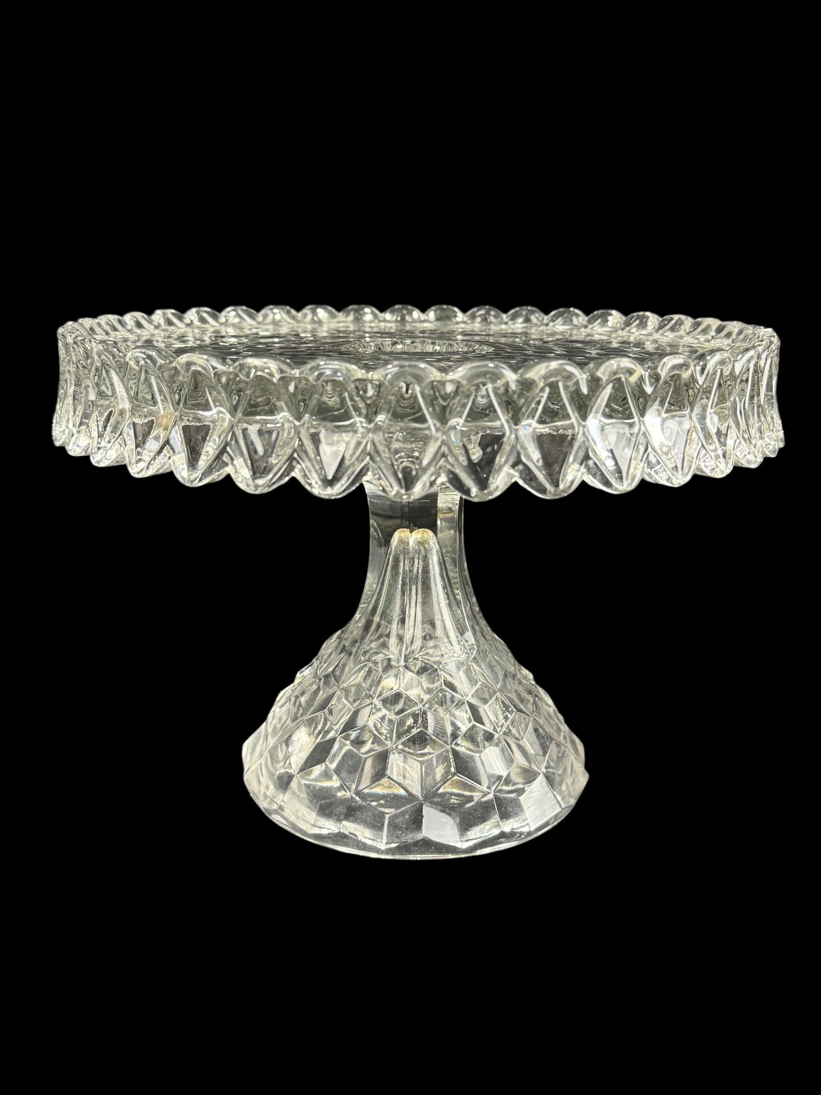 American Fostoria Crystal Glass Cake Stand: American Fostoria Crystal Glass Cake Stand. Measures 7.25" H x 10" Diameter.