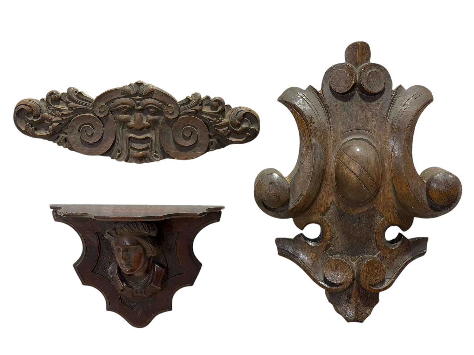 Group of 3 Victorian Walnut Carved Pieces: Group of 3 Victorian Walnut Carved Pieces. Victorian Walnut Plaque measures 15.25" x 5.25". Victorian Walnut Shelf measures 8.25" x 11". Victorian Walnut Crest measures 17.25" x 12.25".