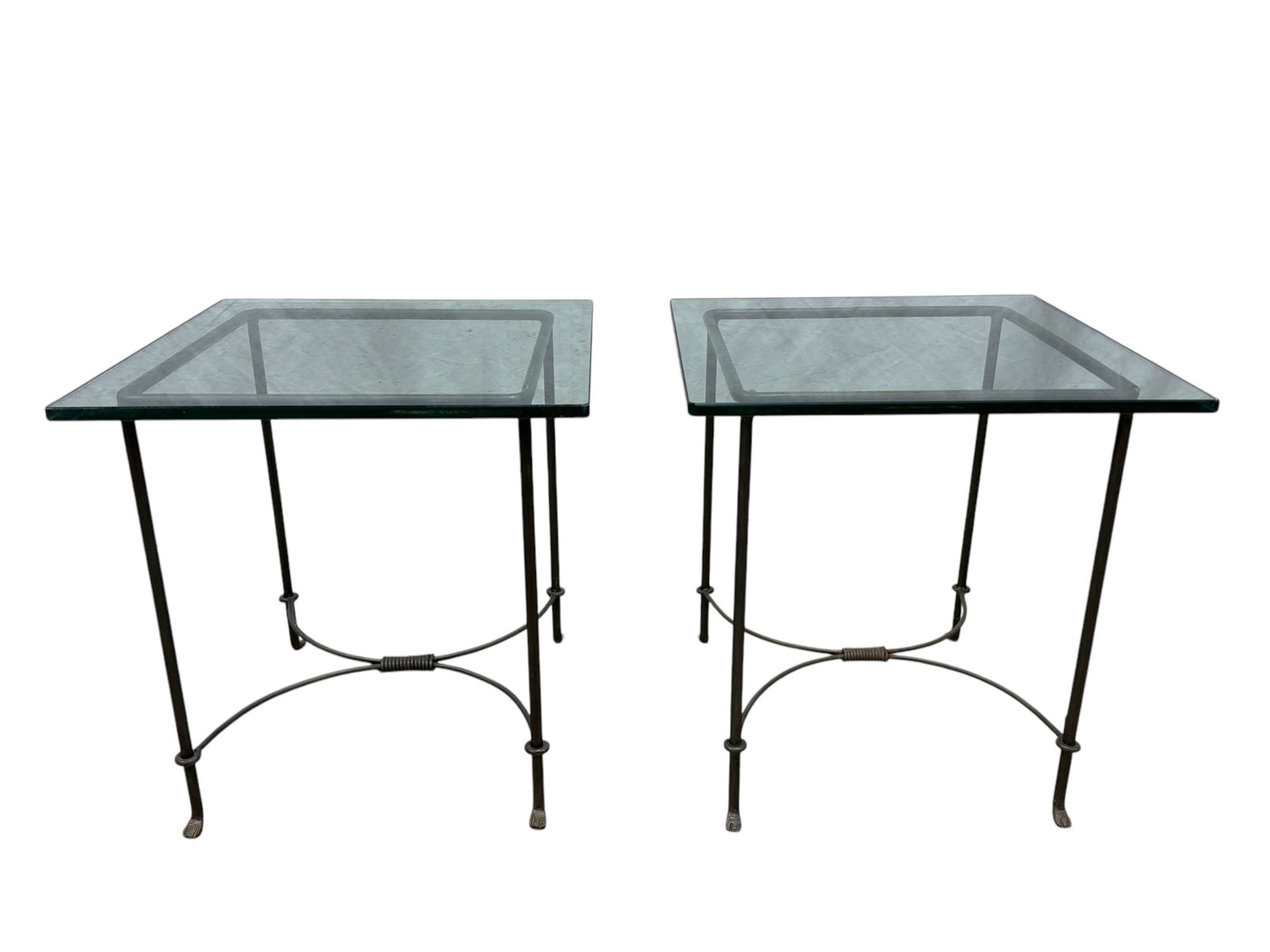 Pair of Iron Base Side Tables w/ Glass Tops: Pair of Iron Base Side Tables w/ Glass Tops. Measures 22.75" H x 22.25" W x 22.25" D.