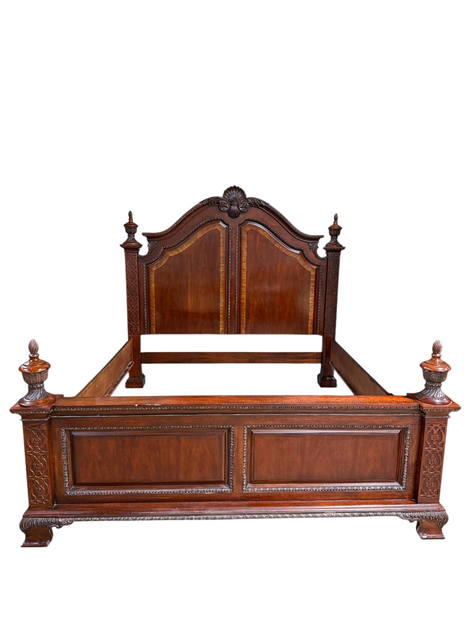 Mahogany Carved Wood King/Queen Size Bed Frame: Mahogany Carved Wood King/Queen Size Bed Frame. Head board measures 76.5" Tall.