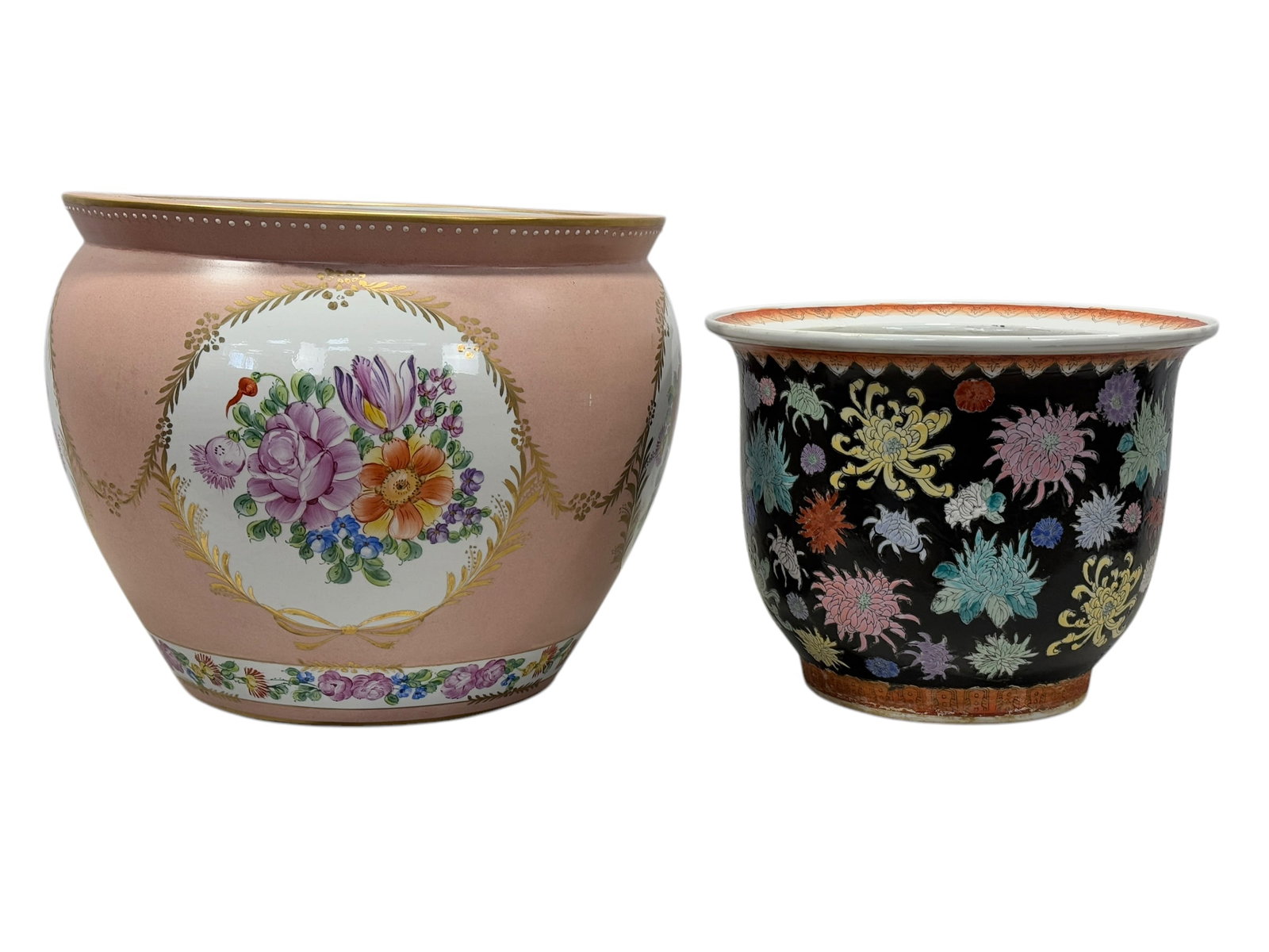 Group of 2 Porcelain Planters: Group of 2 Porcelain Planters. Raised Enamel Floral Design Planter measures 9.5" H x 12.25" Diameter. Dominie's Collection Planter has the label on the bottom and measures 12" H x 15.25" Diameter.
