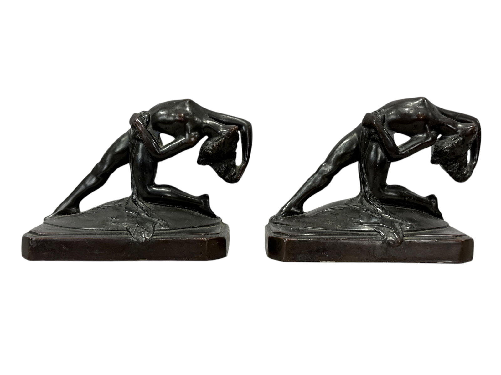Pair of Bronze 1920s Art Deco Nude Female Bookends: Pair of Bronze 1920s Art Deco Nude Female Bookends. Measures 4.75" H x 6.75" W x 2.5" D.