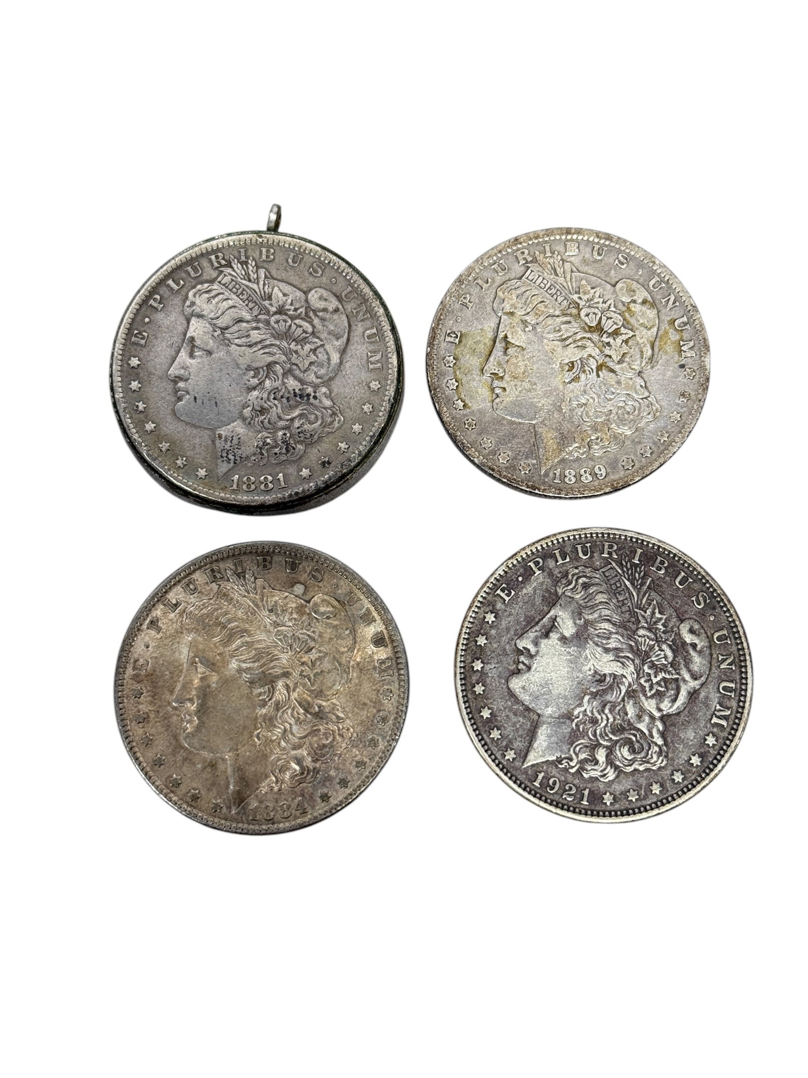 Group of 4 Silver Dollars: Group of 4 Silver Dollars. 1 made into a pendent.