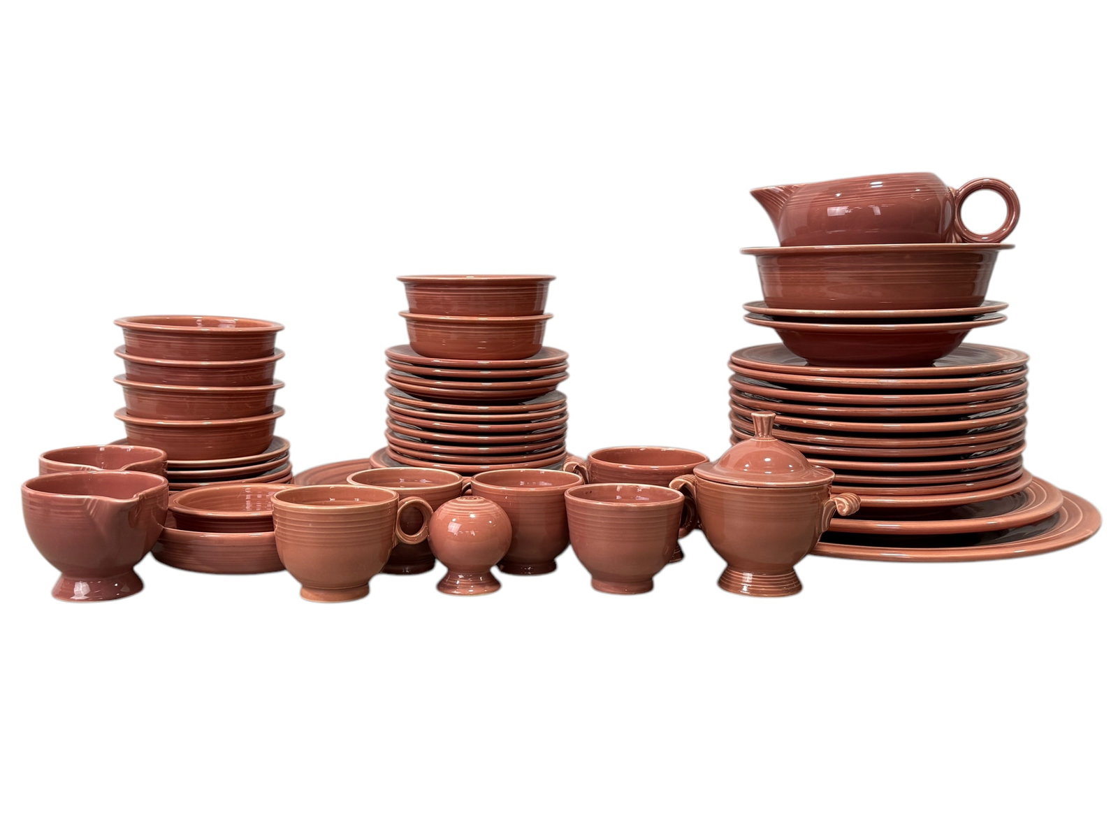 56pc Set of Coral Fiesta Ware: 56pc Set of Coral Fiesta Ware. Marked on the bottom of pieces.