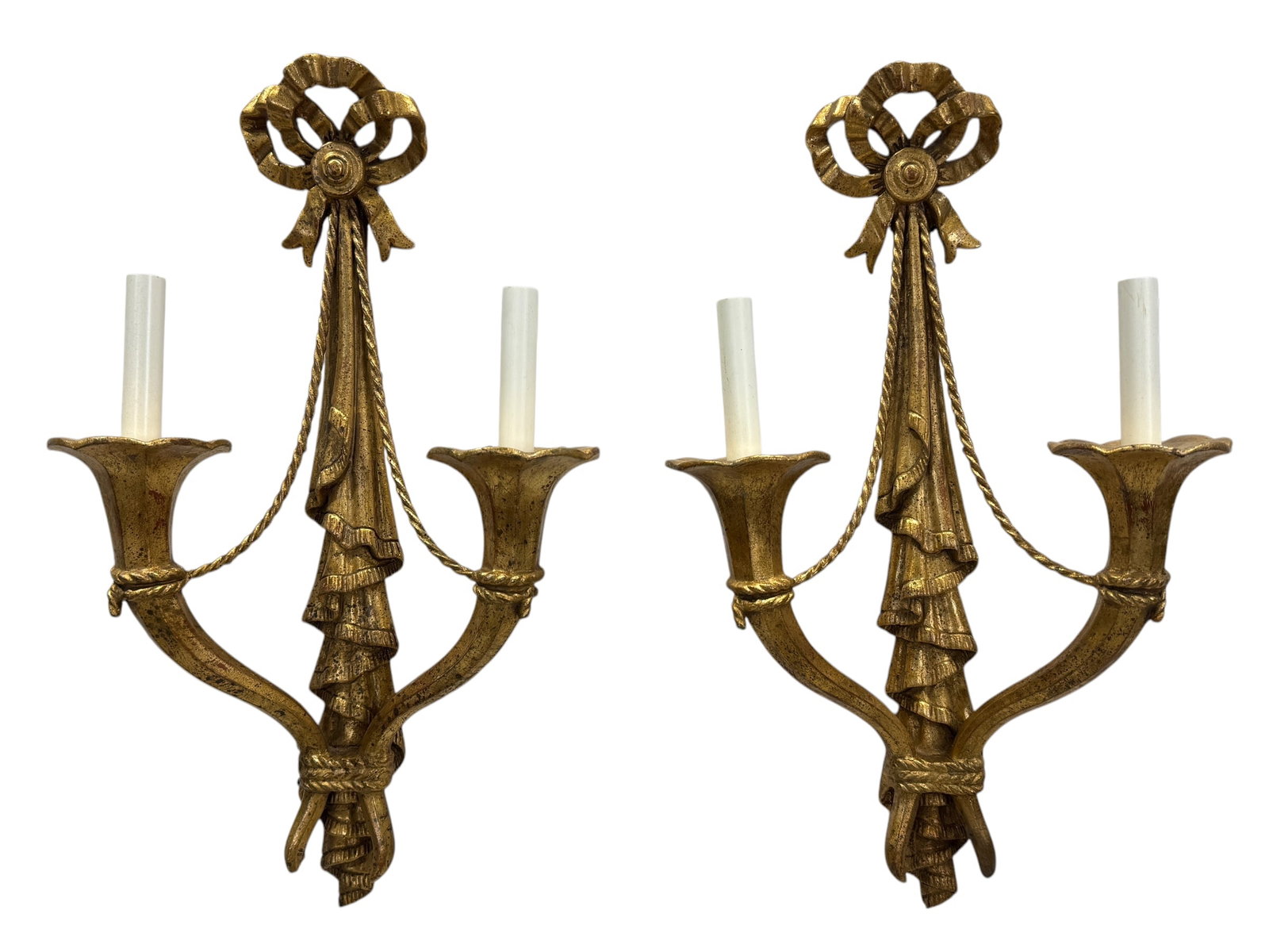 Pair of Italian Giltwood Sconces: Pair of Italian Giltwood Sconces. Marked made in Italy. Measures 21.75" H x 13" W x 6" D.
