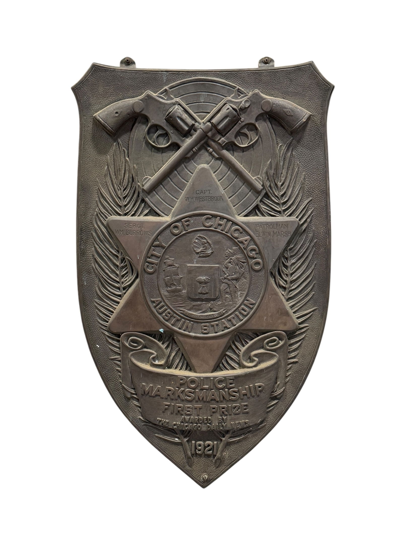 1921 Bronze Chicago Police Marksmanship First Prize Plaque: 1921 Bronze Chicago Police Marksmanship First Prize Plaque. Presented by the Chicago Daily News in 1921 to the Austin Station, cast bronze plaque with crossed revolvers, police star, ribbon, and names