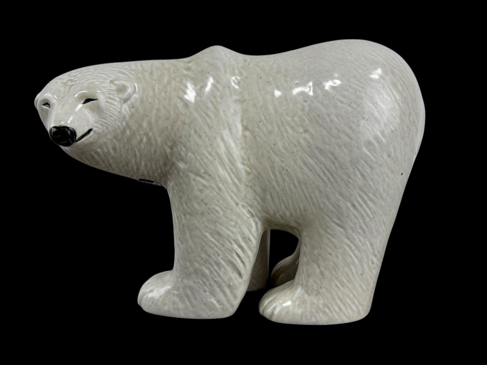 C. 1976 Lisa Larson Stoneware Polar Bear: C. 1976 Lisa Larson Stoneware Polar Bear. Sticker on the bottom. Impressed manufacturer's mark and signature to underside 'Gustavsberg Sweden Lisa'. Swedish c. 1976glazed stoneware Measures 6" H x 8"