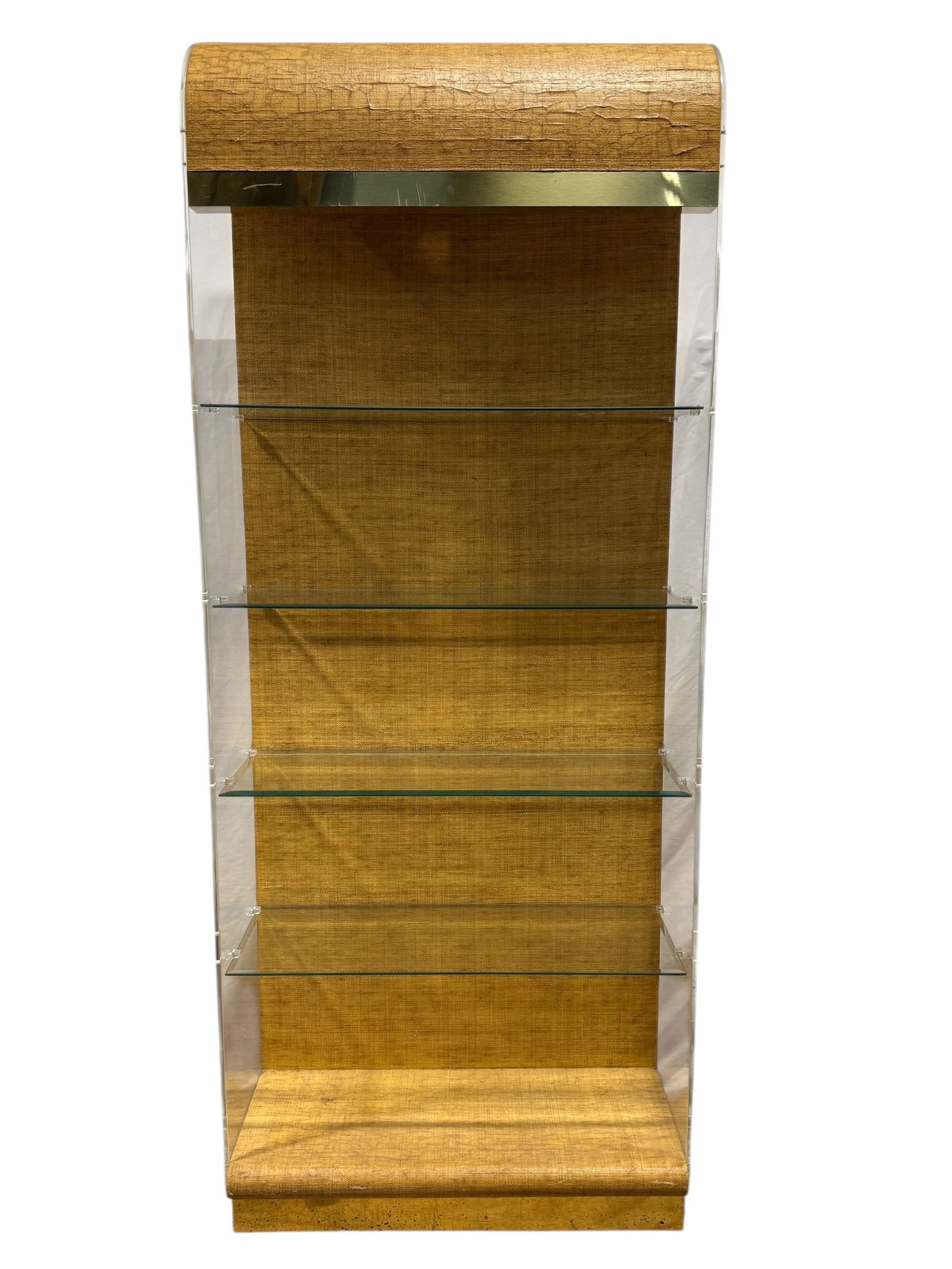 MCM Karl Springer Style Raffia & Acrylic Display Shelf: MCM Karl Springer Style Raffia & Acrylic Display Shelf. Raffia with acrylic sides, glass shelves and brass bands. Measures 78.5" H x 32" W x 14.25" D.