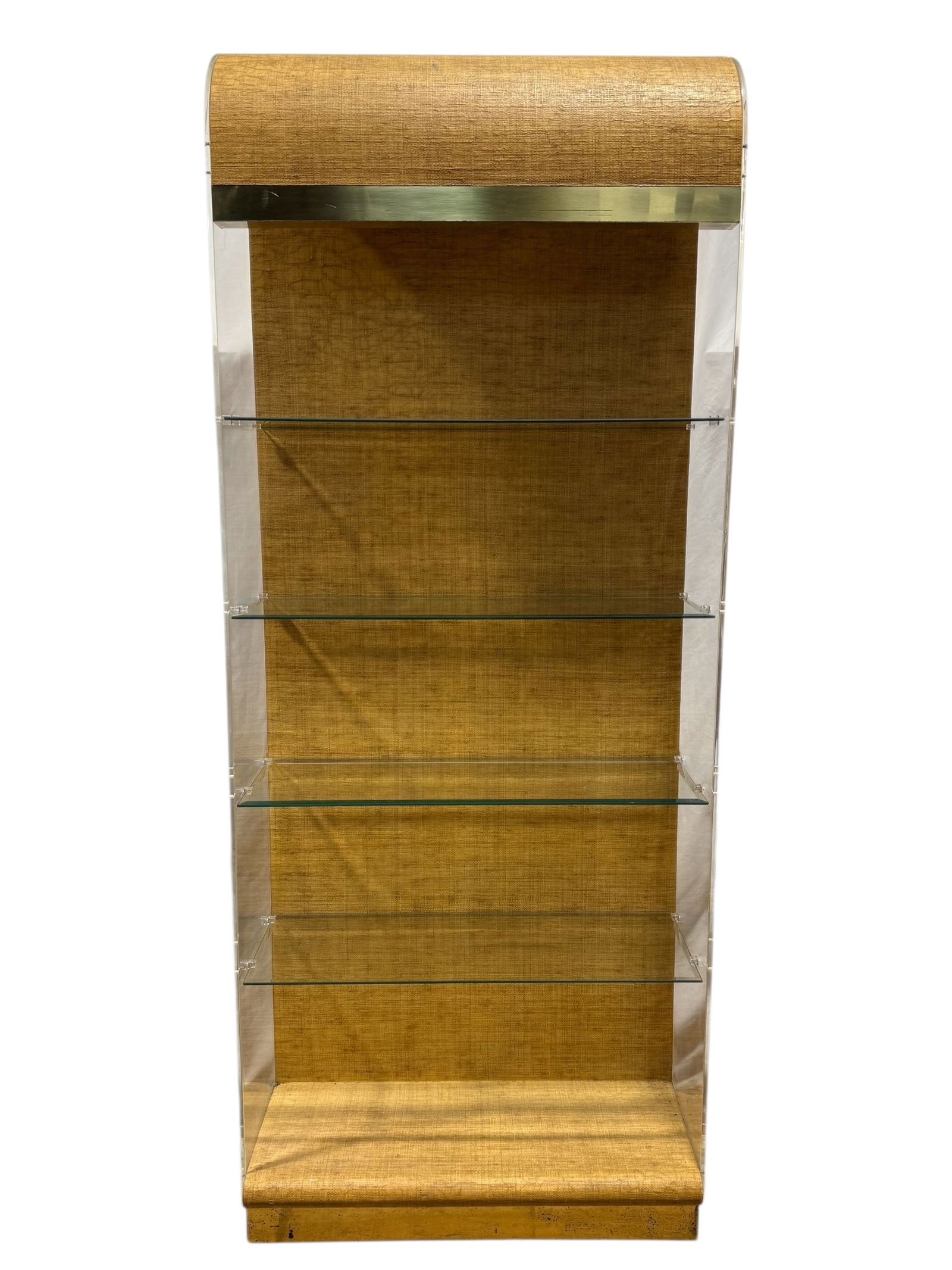 MCM Karl Springer Style Raffia & Acrylic Display Shelf: MCM Karl Springer Style Raffia & Acrylic Display Shelf. Raffia with acrylic sides, glass shelves and brass bands. Measures 78.5" H x 32" W x 14.25" D.