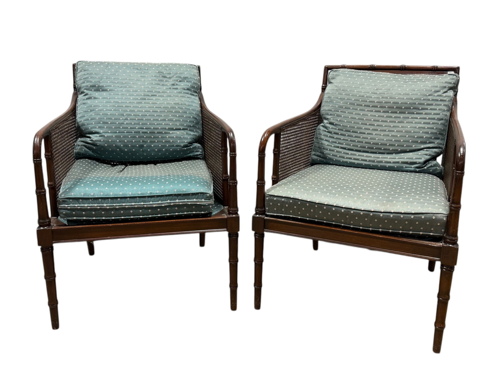 Pair of Hickory Chair Co. Caned & Faux Bamboo Arm Chairs: Pair of Hickory Chair Co. Caned & Faux Bamboo Arm Chairs. Label on the underside of chairs. Faux Bamboo, caned back and caned arms. Measures 33.5" H x 25.5" W x 26.5" D. Seat height measures 19.5" H.