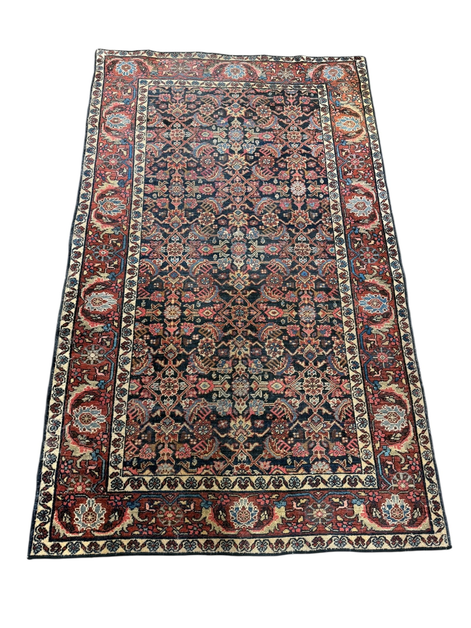 Antique Persian Rug: Antique Persian Rug. Measures 6' 8" x 4' 2".