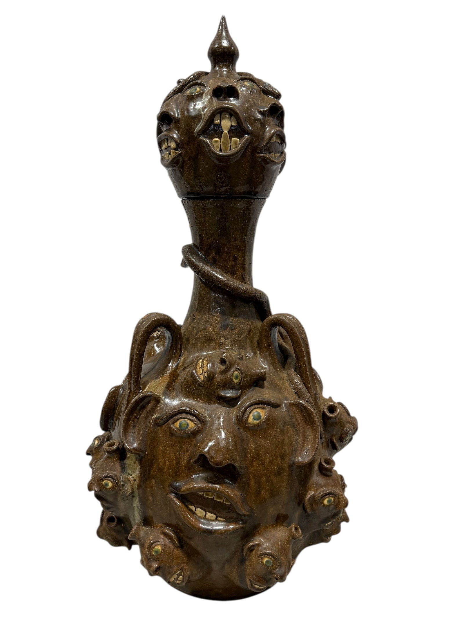 Large Signed Joe Reinhardt Face & Snake Jug: Large Signed Joe Reinhardt Face & Snake Jug. Signed on the underside, has signature hearts and signature J.R. heart signaure. Measures approx. 28.5" H x 15" W x 15" D.