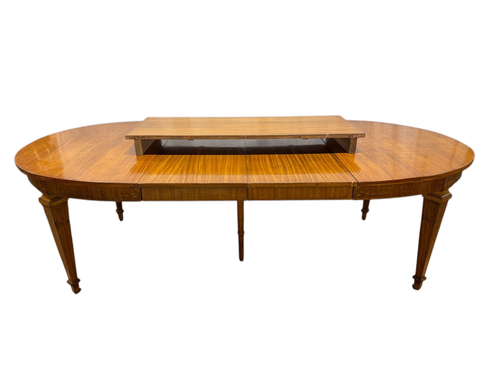 19th C. French Louis XVI Inlaid Walnut Dining Table w/ 3 Leaves: 19th C. French Louis XVI Inlaid Walnut Dining Table w/ 3 Leaves. Table skirt and legs have floral design inlay. Table measures 29" H x 59.5" W x 47.5" D. Leaves measure 18" W x 47.5" D.