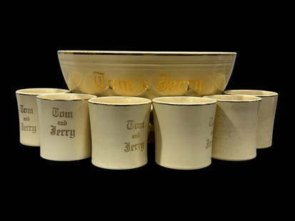 7Pc Fiesta Tom & Jerry Punch Bowl Set: 7Pc Fiesta Tom & Jerry Punch Bowl Set. Bowl measures 5.5" H x 11.25" W x 11.25" D. 6 Cups measure 3" Tall each. Showing wear from use.