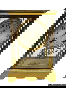 Antique Brass Seth Thomas Crystal Regulator Mantel Clock: Antique Brass Seth Thomas Crystal Regulator Mantel Clock. Clock face marked Seth Thomas. Has key. Measures 9.75" H x 6.75" W x 5.25" D. Showing same patina and has scuffs. Is working but, as with any