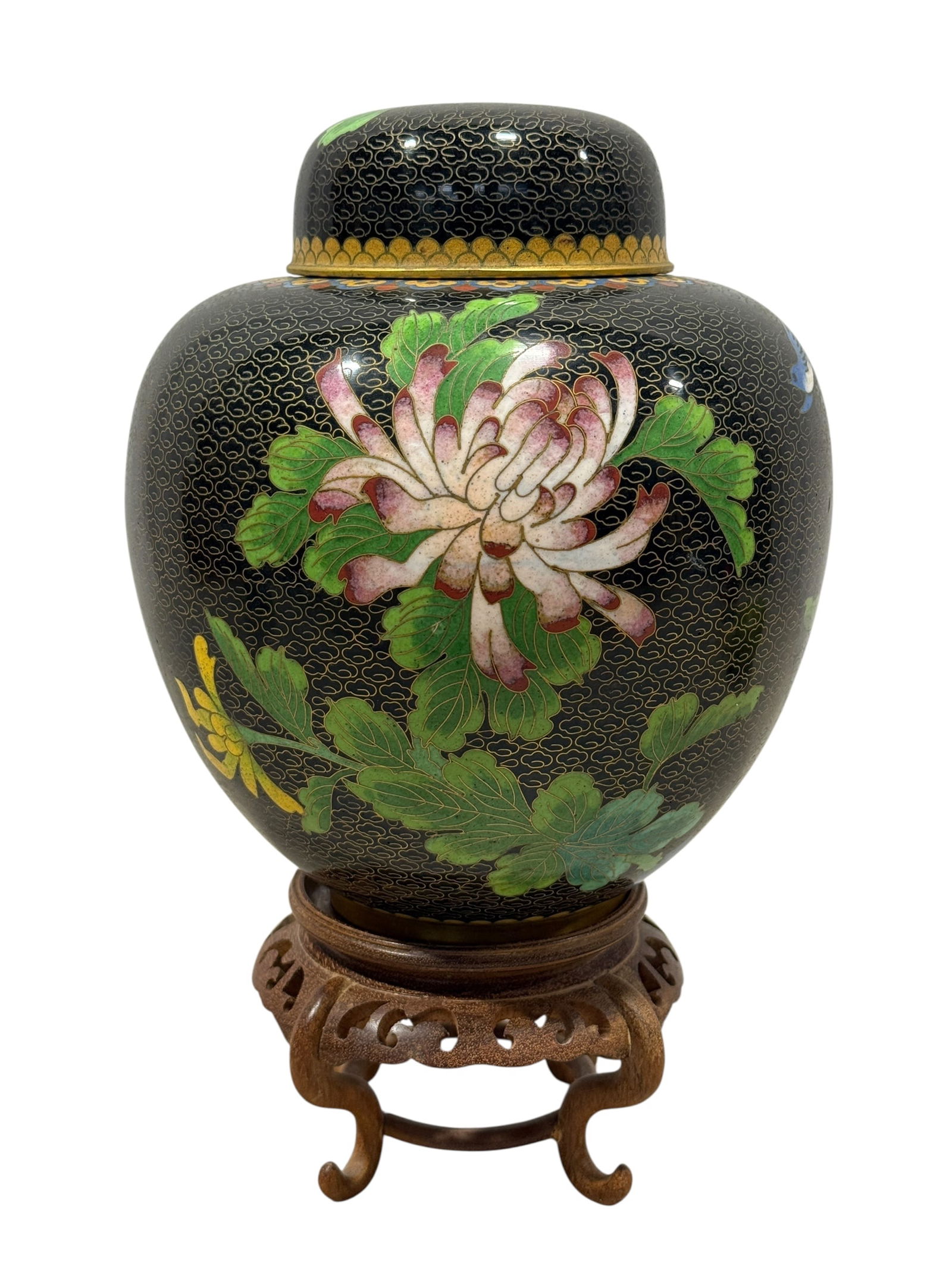 Lidded Cloisonne Urn on Wood Base: Lidded Cloisonne Urn on Wood Base. Measures 8" H x 7" W x 7" D. In good condition.