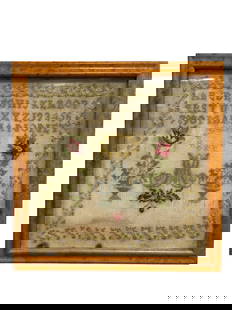 Framed Early Needlepoint Sampler: Framed Early Needlepoint Sampler. Depicting alphabet, numbers, "M", and urns with flowers. Overall measures 14" x 14".