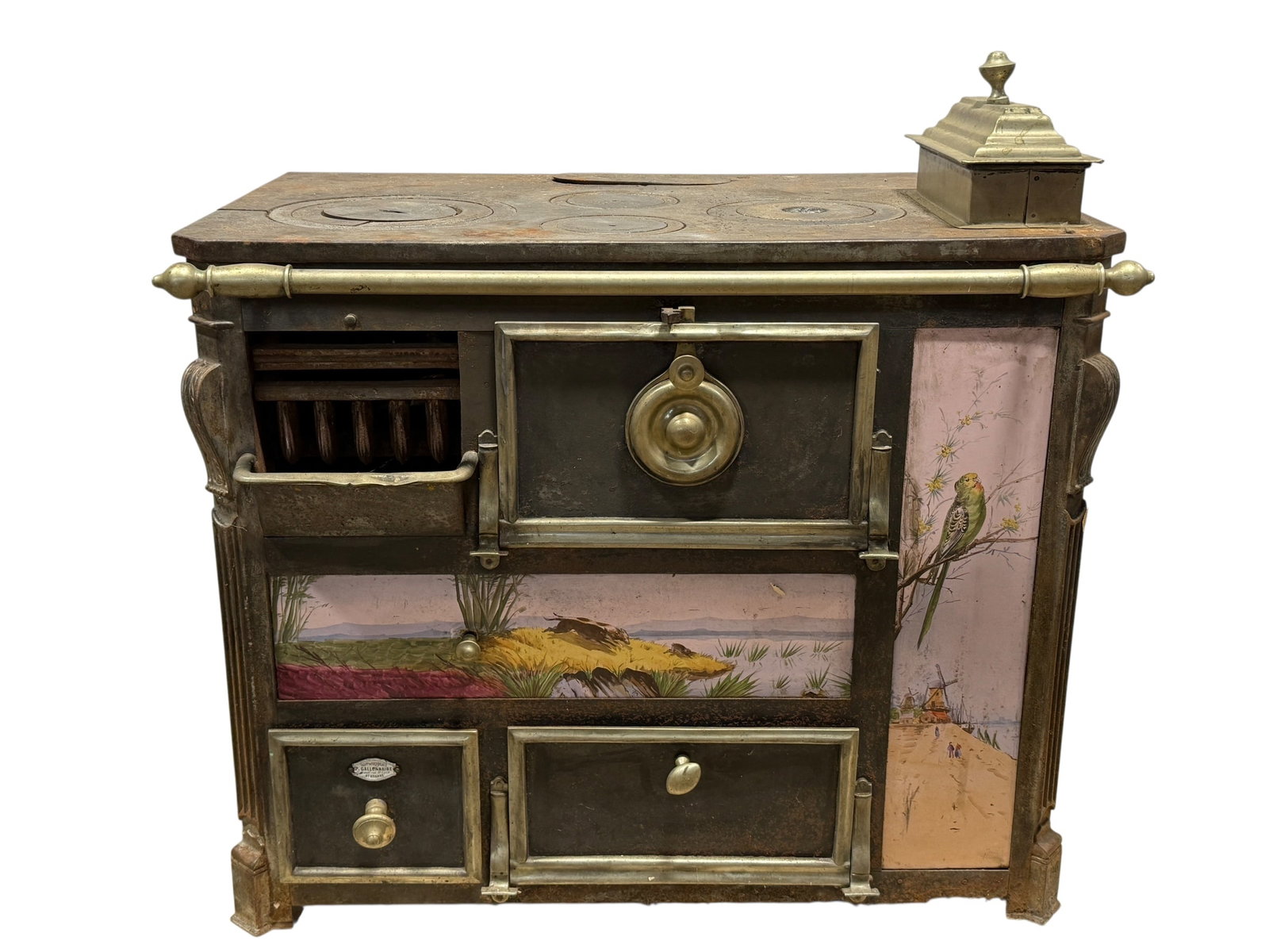 Late 19th C. P. Gallonnaire French Cast Iron Stove: Late 19th C. P. Gallonnaire French Cast Iron Stove. Label on bottom drawer. P. Gallonnaire is a manufacturer of safes and furnaces (FABx de FOURNEAUX) located on Rue S. Roch in St. Etienne, France. Me