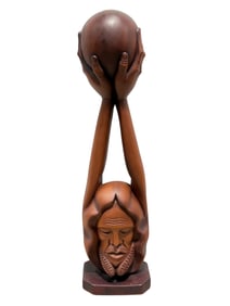African Wood Carved Man Holding a Ball