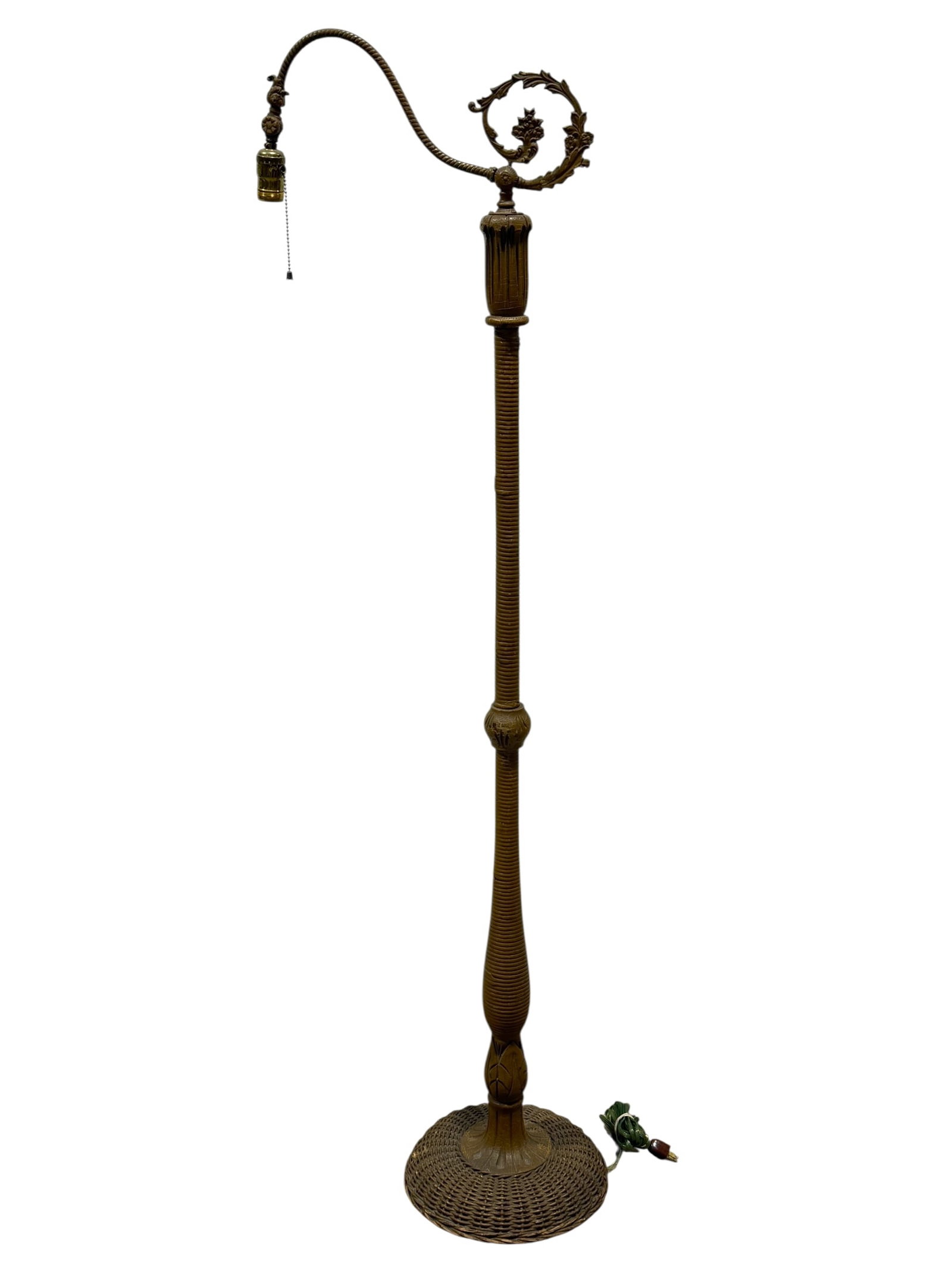 Vintage Rattan Bride Floor Lamp: Vintage Rattan Bride Floor Lamp. Measures 59.5" Tall. Is working, has scuffs scuffs and scratches.