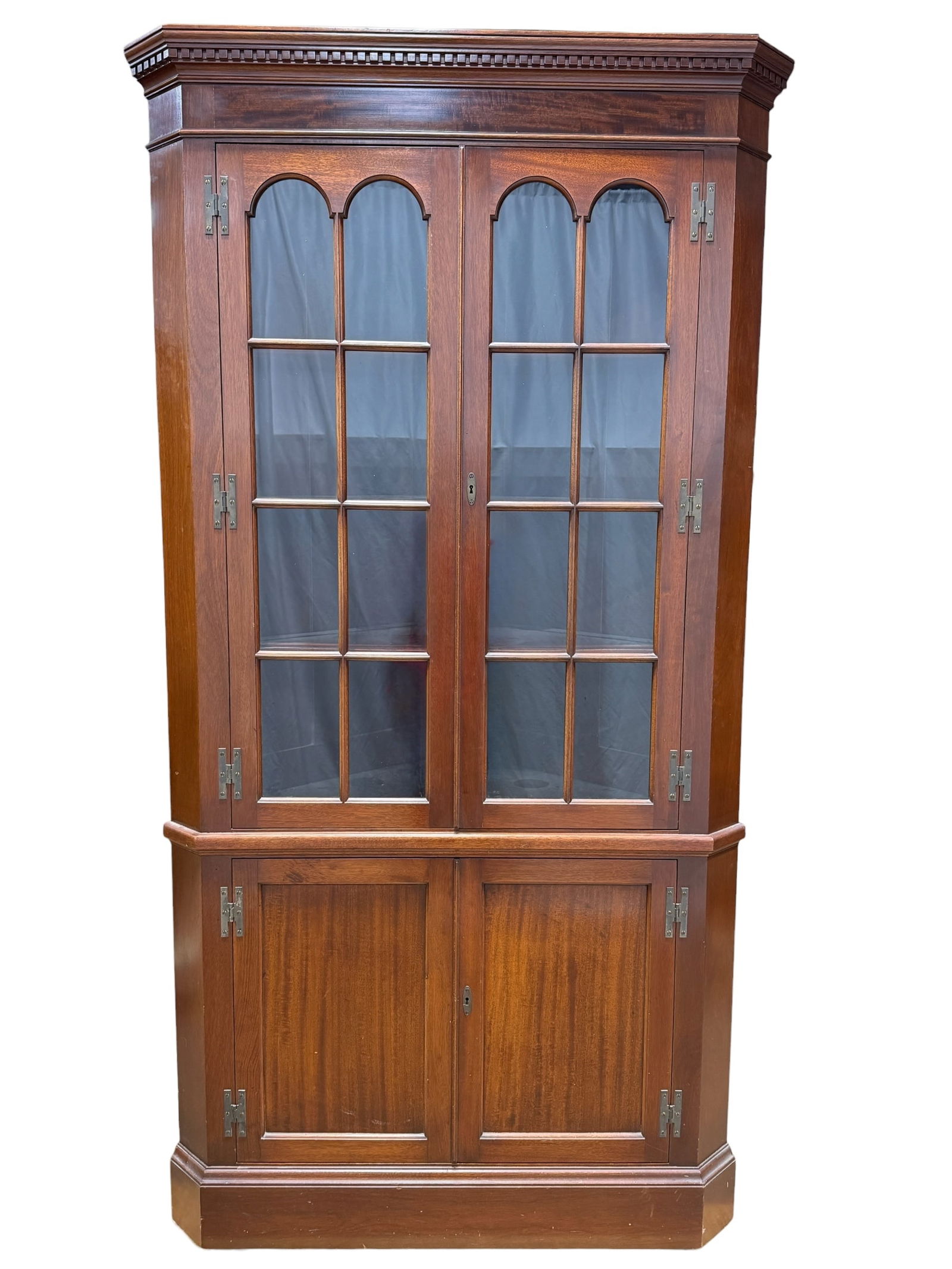 Norris Furniture Mahogany Corner Cabinet: Norris Furniture Mahogany Corner Cabinet. Double stamped on the backside of cabinet on the top. Measures 80.25" H x 42.25" W x 22.5" D. Has some scuffs and scratches.