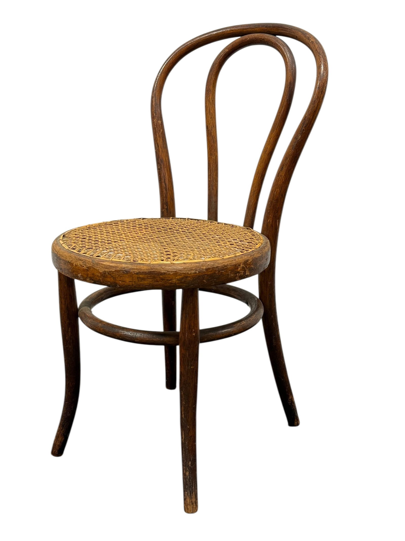 20th C. Vienna, Austria Childs Bentwood Caned Chair: 20th C. Vienna, Austria Childs Bentwood Caned Chair. Vienna, Austria label on the underside. Measures 27" H. Seat height measures 14.75" H. Condition reflects its age.