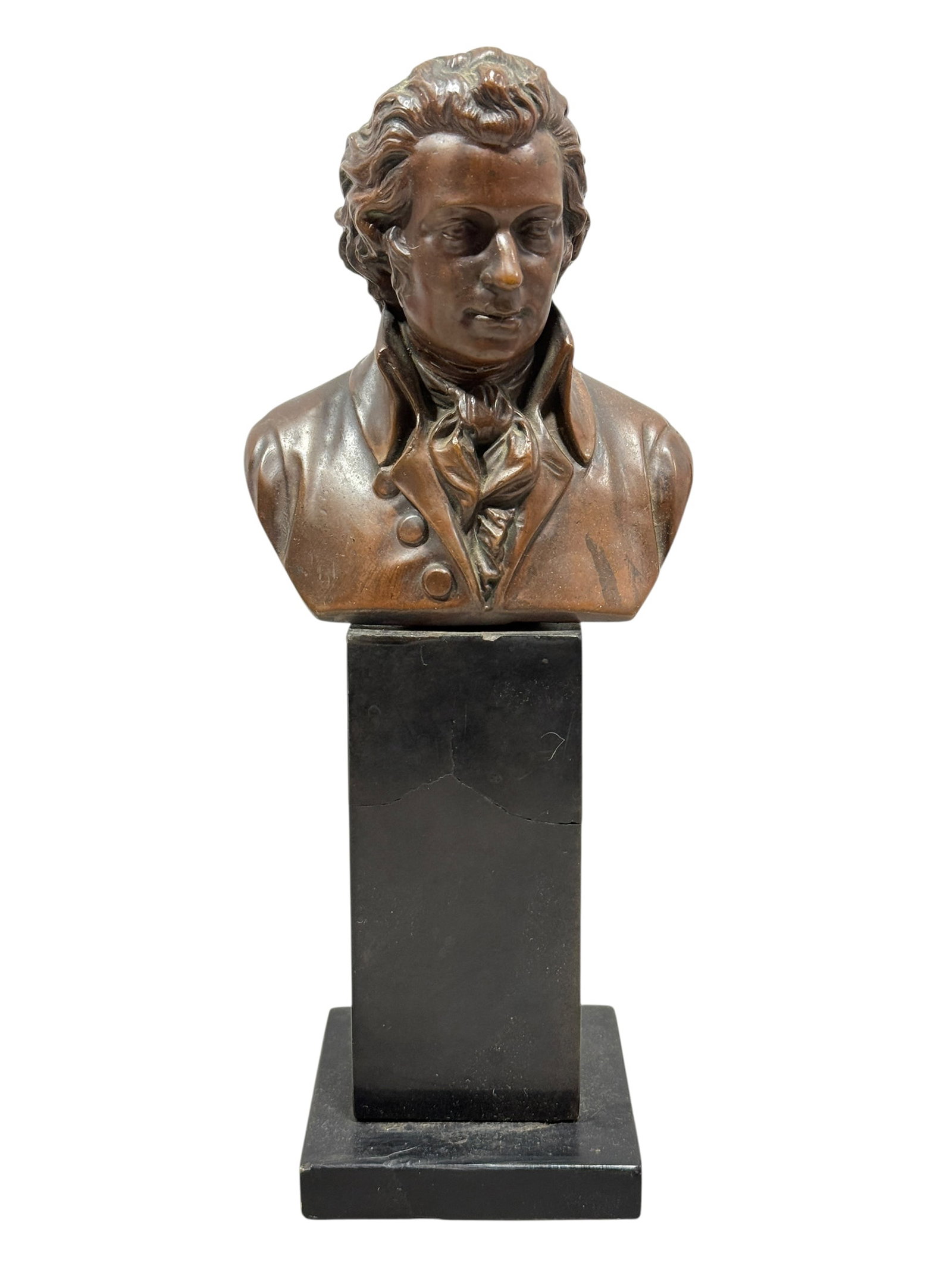 Bronze Wolfgang Amadeus Mozart Sculpture on Slate Base: Bronze Wolfgang Amadeus Mozart Sculpture on Slate Base. Measures 10.5" Tall. Base has some chips and cracks.